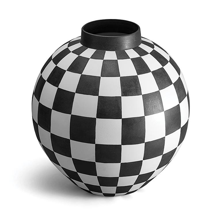From the French term for “checkerboard”, this iconic graphic pattern is adapted and re-interpreted. These porcelain vases are hand painted in a rich indigo glaze by skilled artisans out of our Portuguese atelier.

Craftsmanship: Due to the artisanal