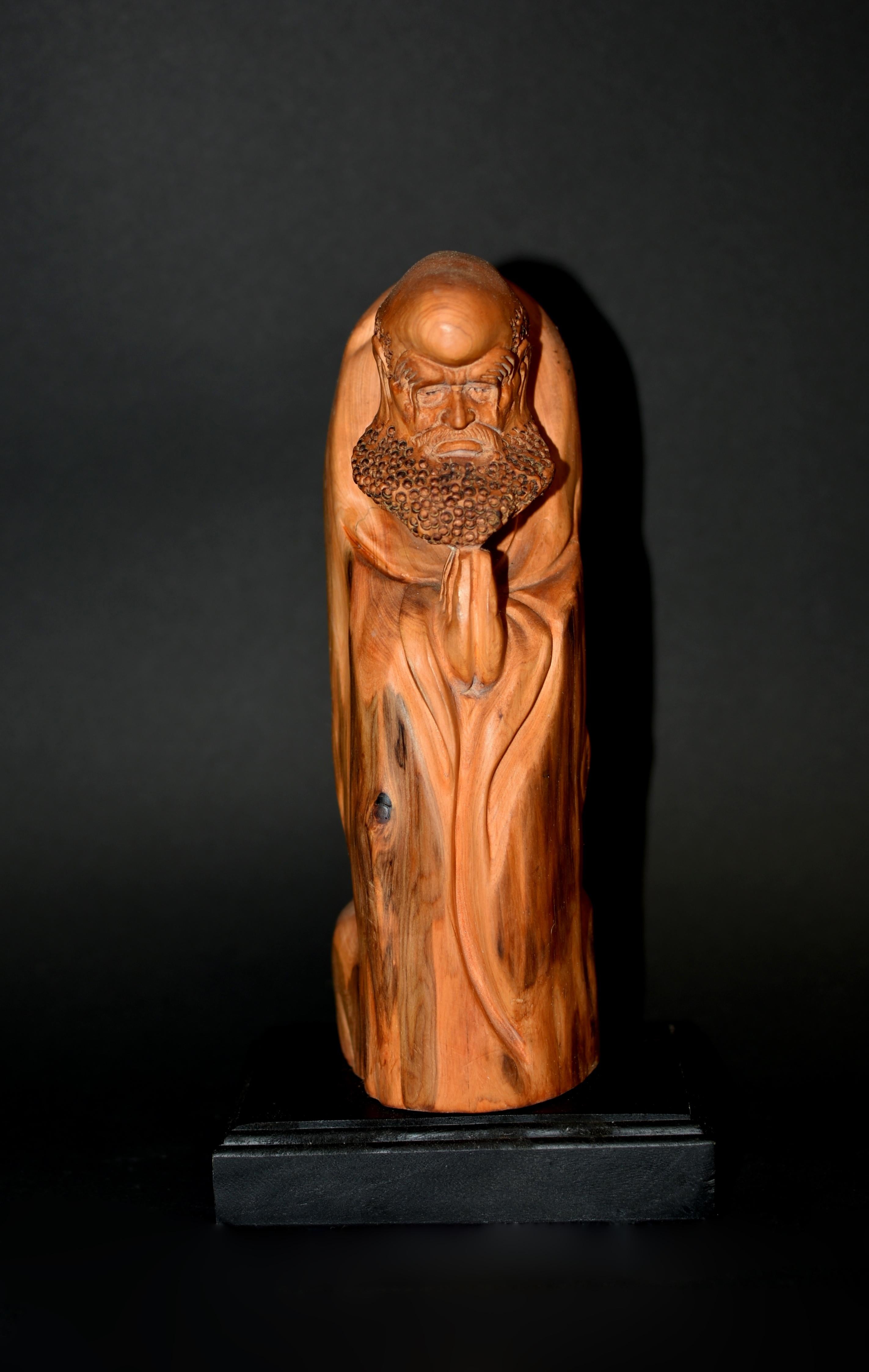 A beautiful solid camphor wood statue of the legendary Buddhist monk Bodhidharma (Damo), who is believed to be the saint who introduced Buddhism to China, Damo represents 