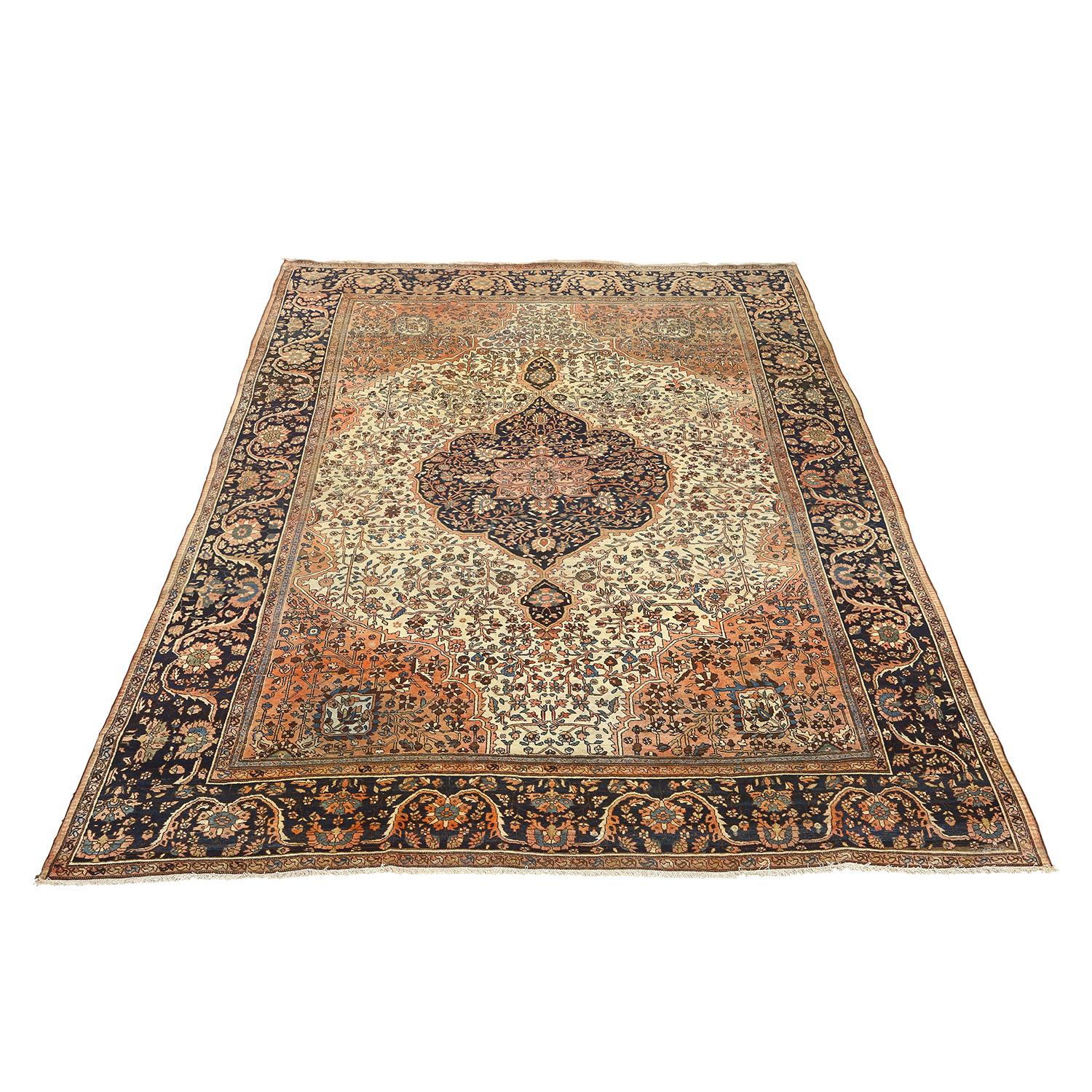 This Antique Farahan is a masterpiece of enduring opulence and unparalleled craftsmanship. Originating from the esteemed Farahan region in Persia, these rugs are not just floor coverings; they are exquisite works of art that radiate timeless