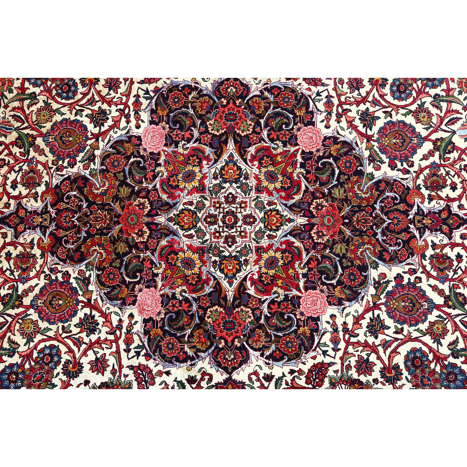 This Antique Kashan Rug is a testament to the enduring allure of Persian craftsmanship. Measuring a generous 14 feet by 10 feet, it features a luxurious composition, woven with a background of silk and kork, supported by a sturdy cotton