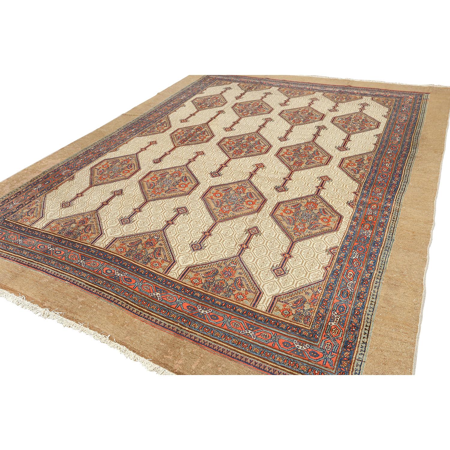 This Antique Sarab Rug, measuring 12 feet by 9 feet, is a captivating testament to Persian craftsmanship and artistry. Featuring a mesmerizing All-Over Design, adorned in soft, creamy hues with delightful pops of color, it is a visual symphony that