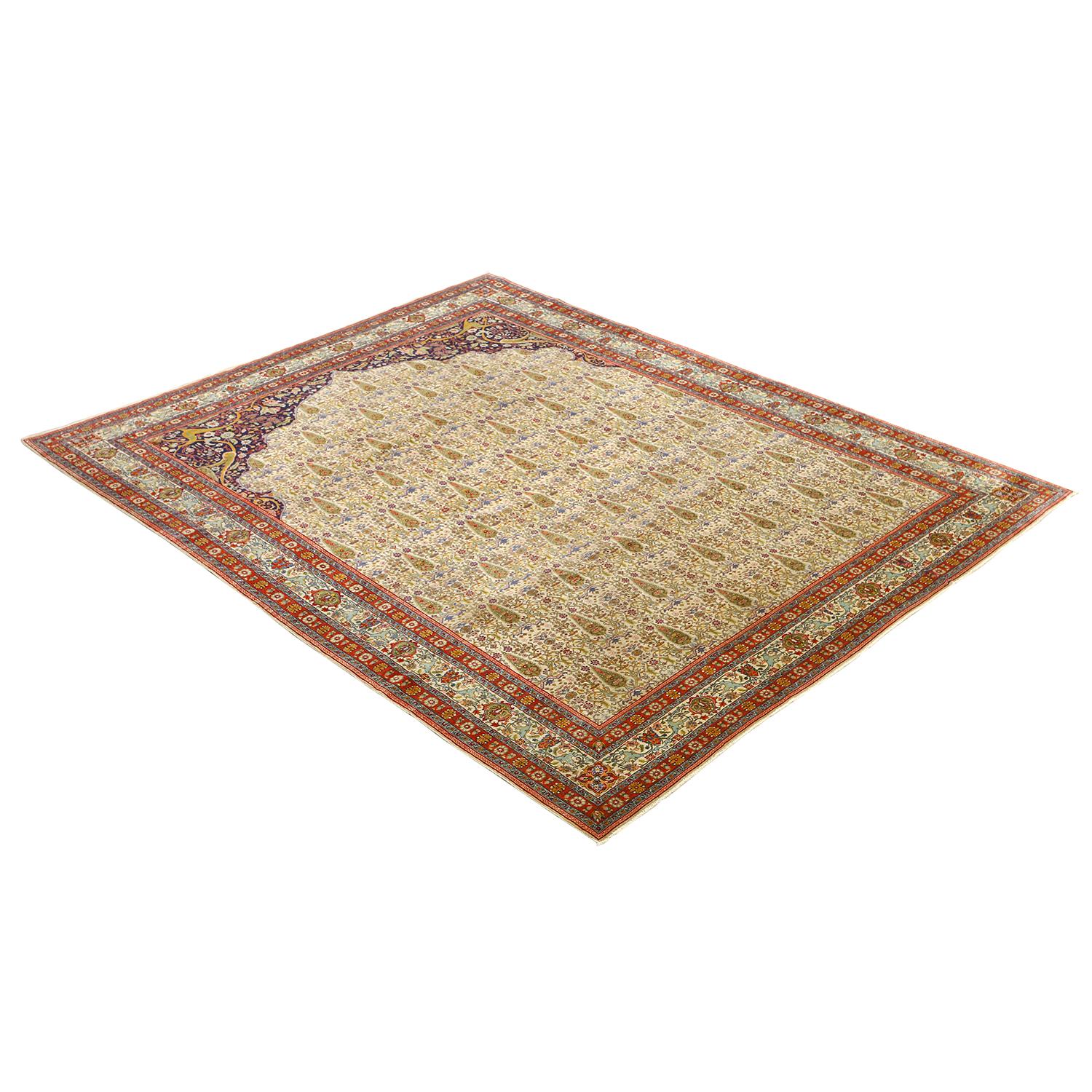 This Antique Tabriz Rug with a Prayer Design is a captivating blend of artistic expression and spiritual reverence, hailing from the renowned weaving city of Tabriz in Persia. These rugs are not merely decorative; they are profound statements of