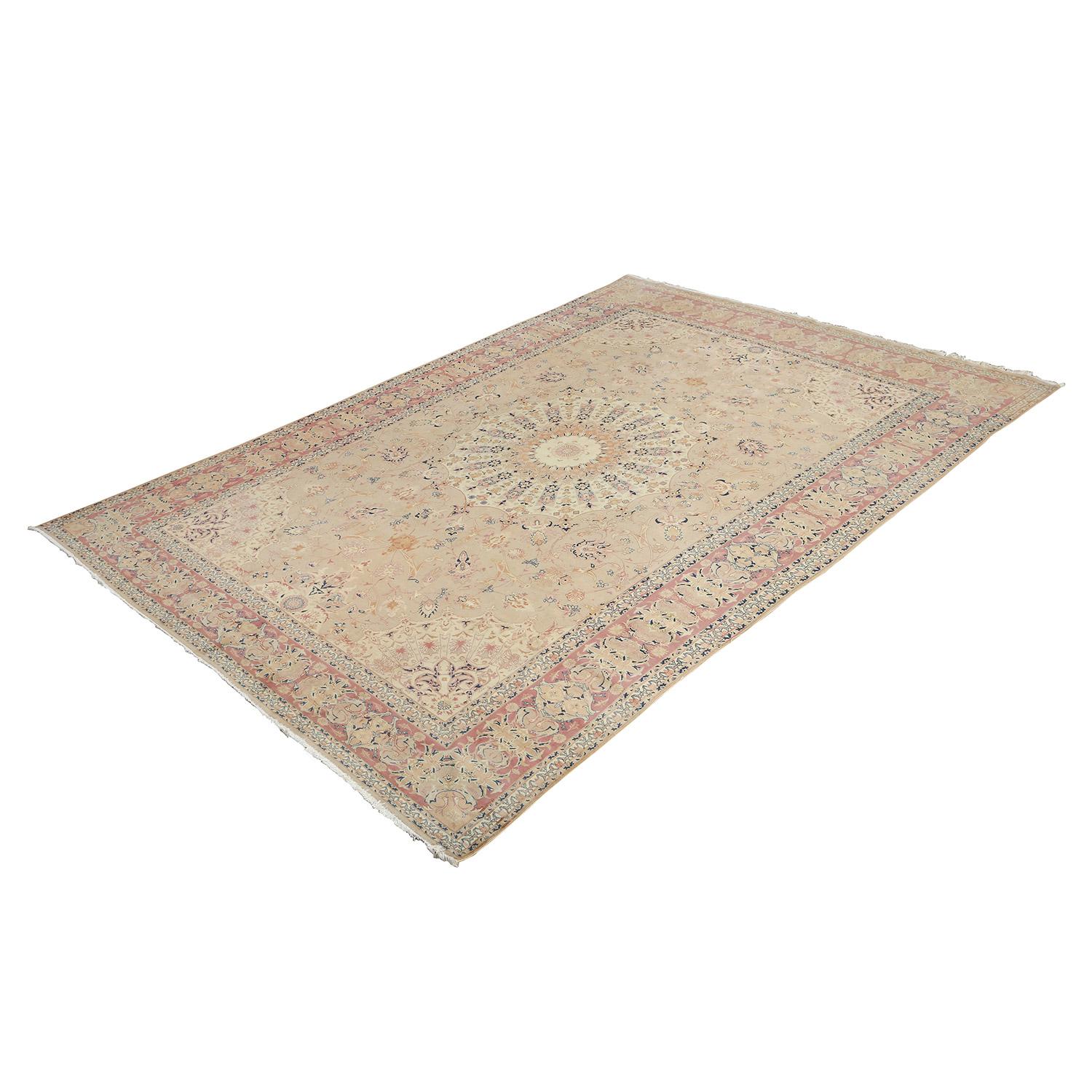 This vintage Tabriz Emad rug, with a history spanning approximately 60 years, is a testament to the enduring beauty of Persian weaving traditions. Crafted with a cotton foundation and a luxuriously soft wool pile, it embodies the essence of both