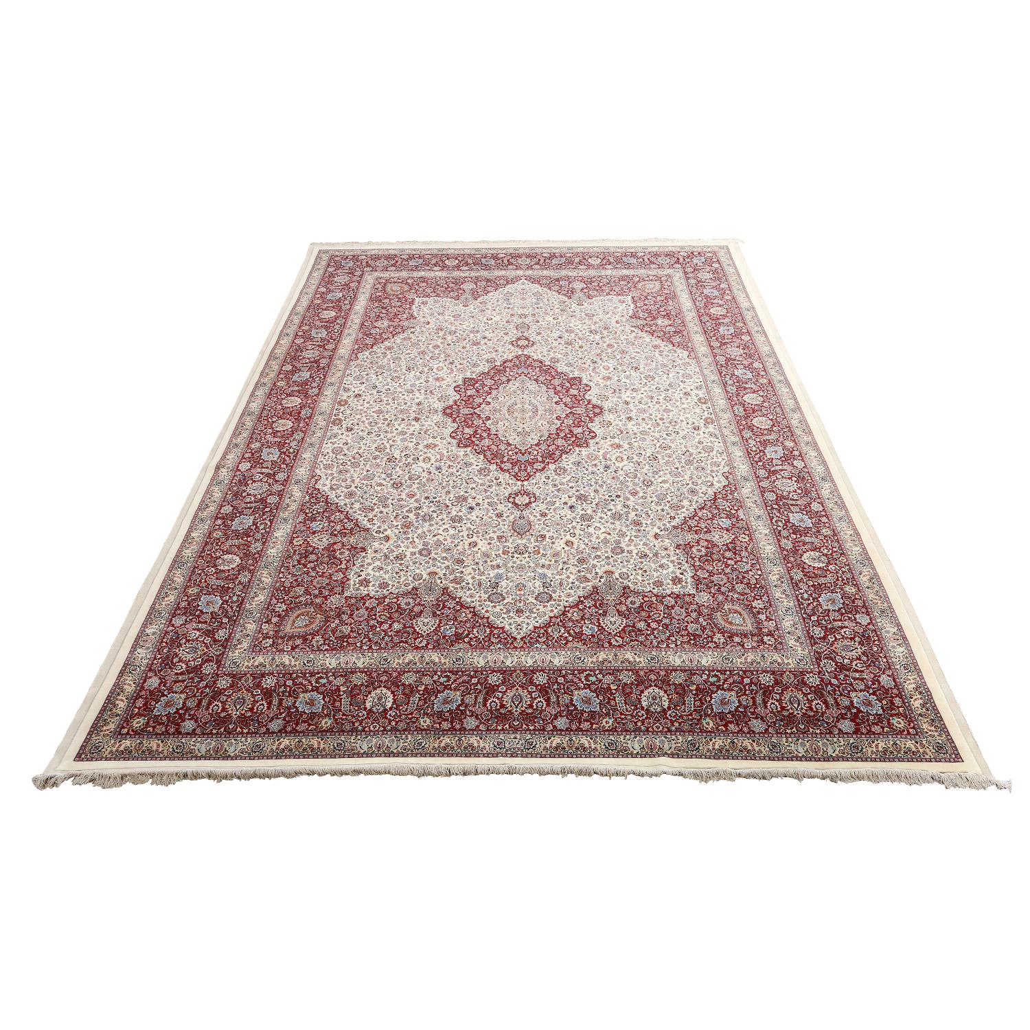 This vintage Mashad Amoghli rug is an extraordinary masterpiece, exuding timeless elegance and craftsmanship. Measuring an impressive 17 feet 2 inches by 11 feet 7 inches, and handmade with 1000 knots per inch, is a substantial work of art that will