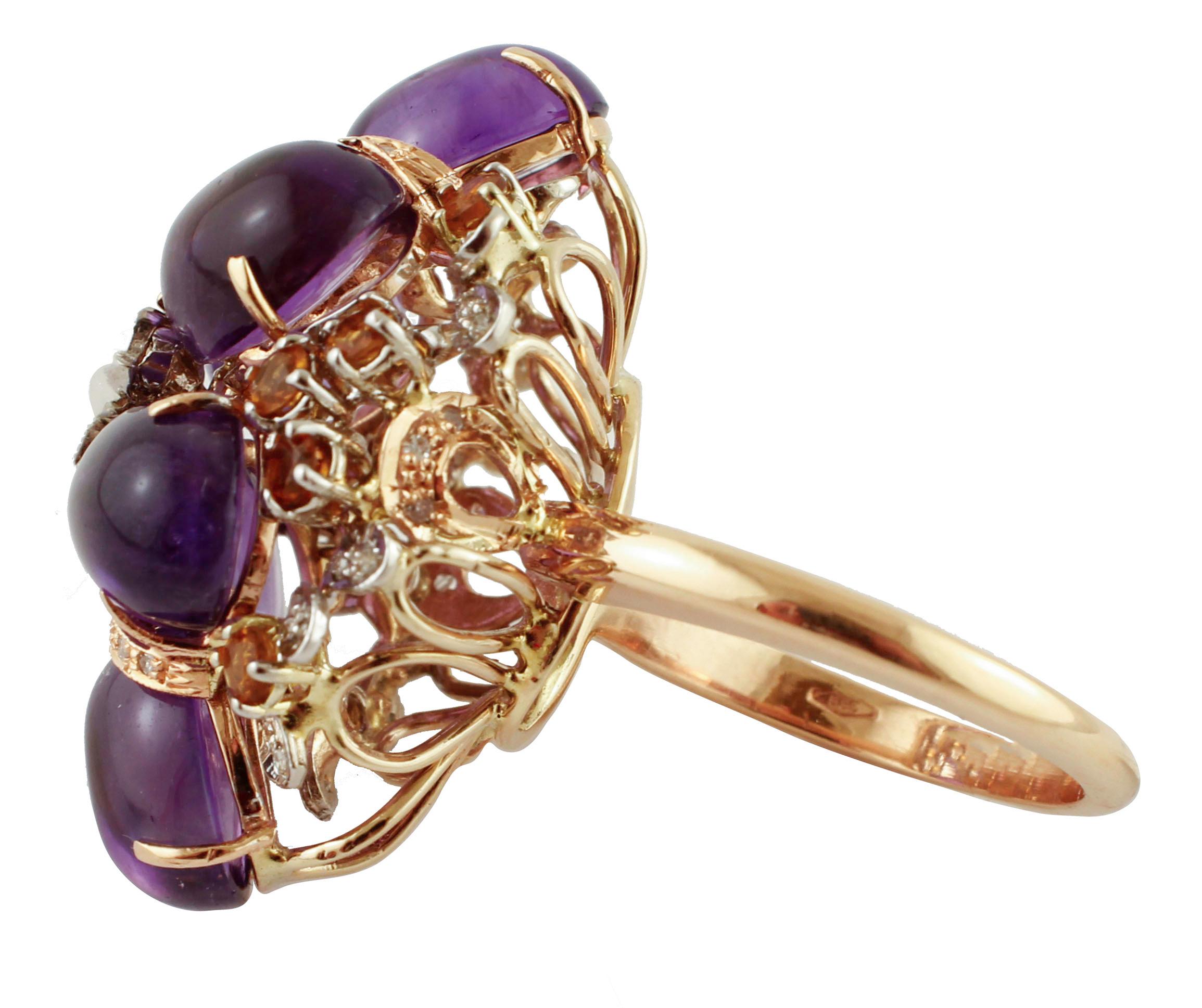 Gorgeous cluster retrò ring realized in 14K rose and white gold embellished with 18.54 ct of central amethysts and yellow topazes on the two sides. It is adorned with 0.30 ct of little diamonds on the two sides, and central 14K white gold flower