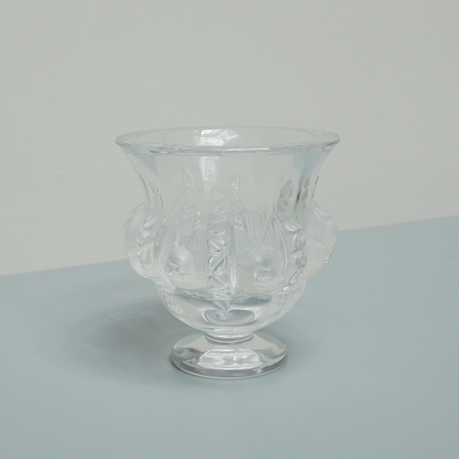 A clear crystal vase with satin finish by Marc Lalique depicting Fauna and Flora. Etched 'Lalique France' to base. Originally designed by Marc Lalique in 1948.

Dimensions: H 12.5cm W 12cm

Origin: France 

Date: Circa 1960

Item Number: 1507231