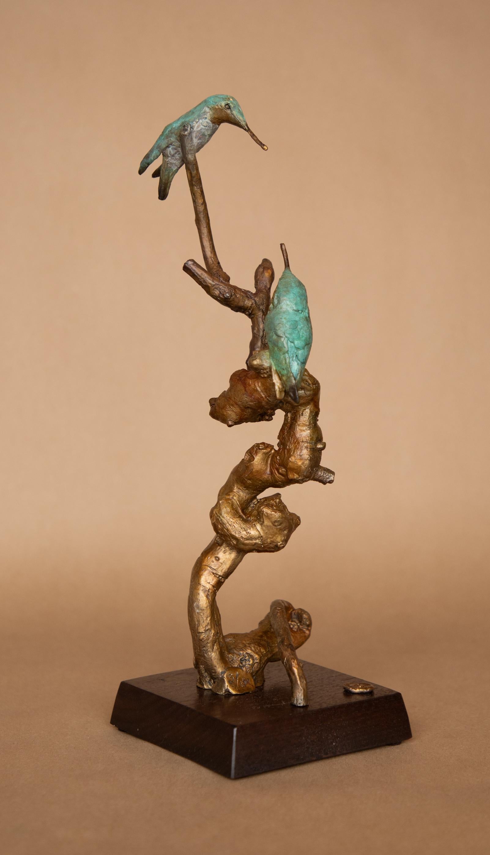 Inscribed signature by the Artist on the bronze base of the piece with an edition number.
3/150