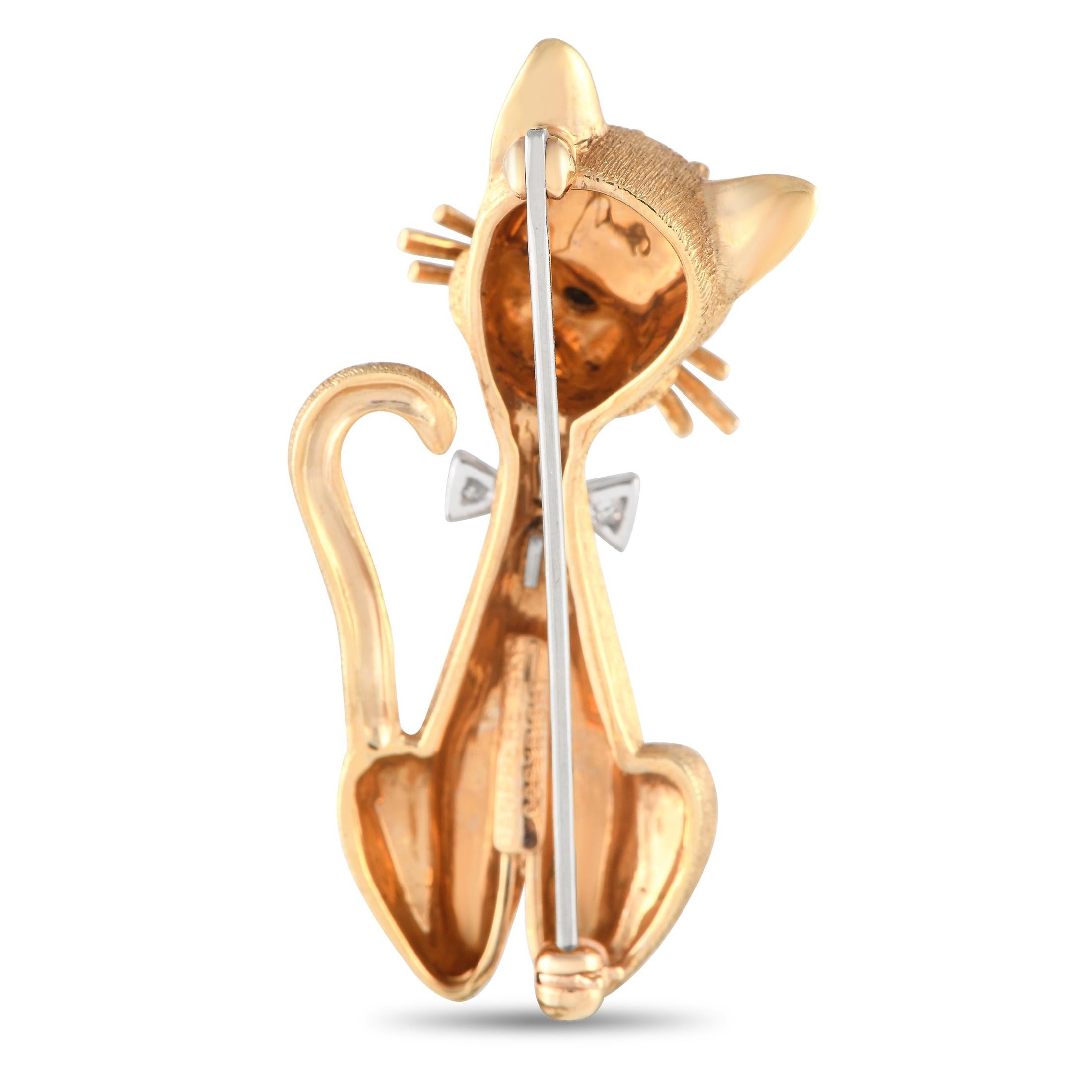 An intricately fashioned brooch to bring a touch of whimsy and a hint of class to an outfit. Designed by Dan Frere, this brooch takes the form of a cat in solid 14K yellow gold detailed with textured and high-polish finishes. The golden cat brooch