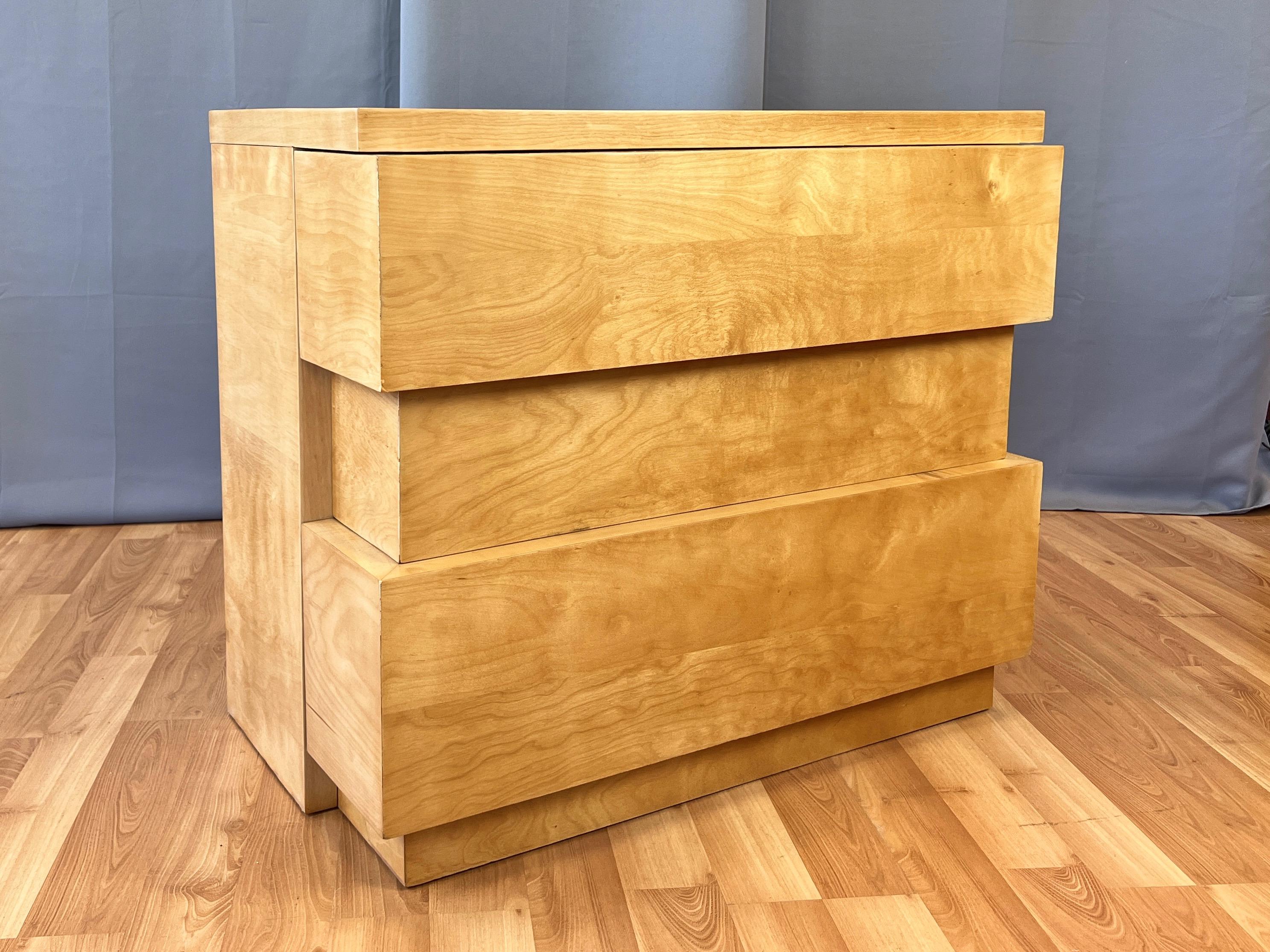 A rare 1946–1947 mid-century modern three-drawer chest or dresser in maple by Dan Johnson for Hayden Hall.

Early piece in a prescient contemporary-looking minimalist geometric style specific to a collection he did for Hayden Hall. Represents an