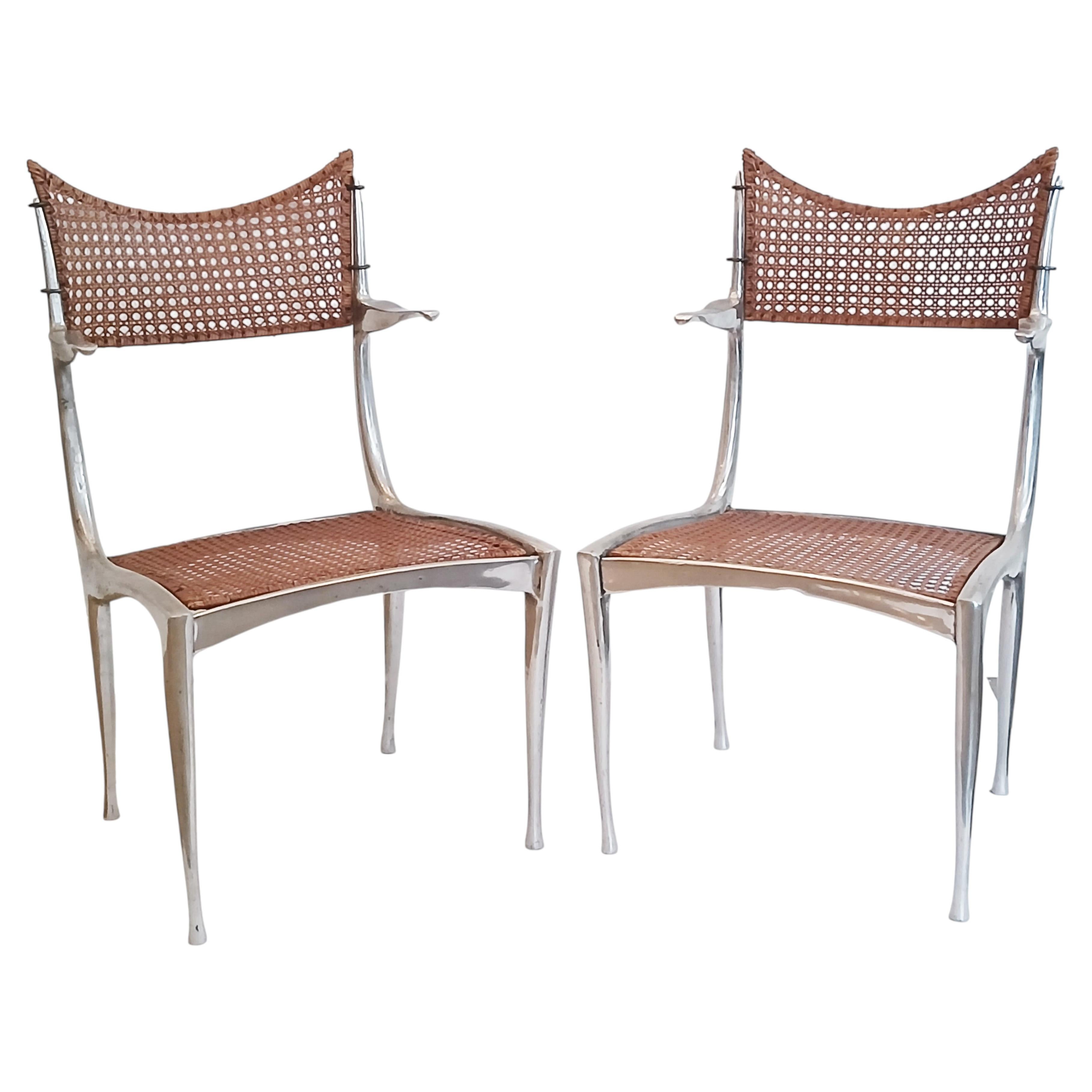Sillones "Gacela" de Dan Johnson, de mediados de siglo, en aluminio y caña
