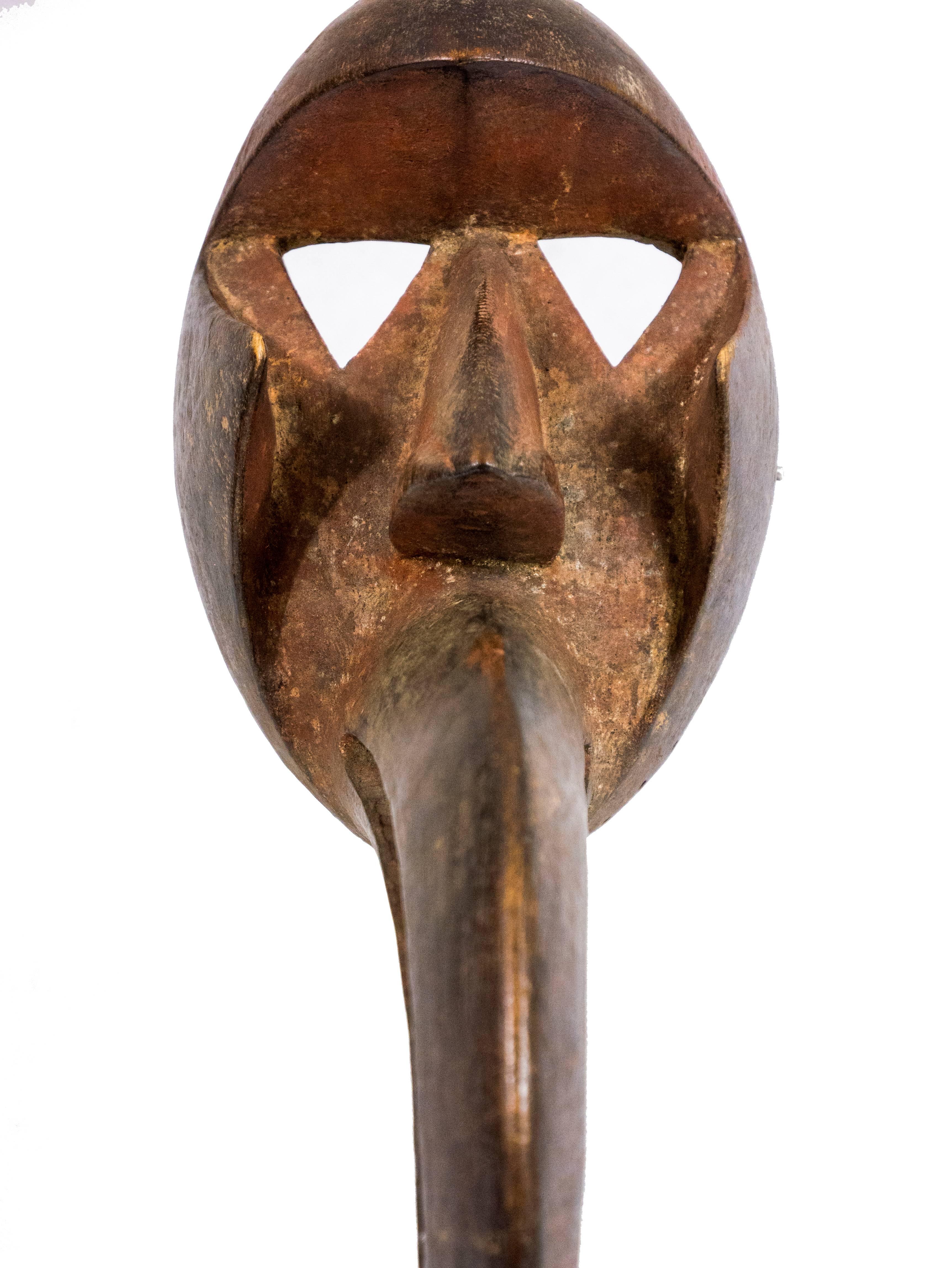 Dan Kagle mask
Dan people; Ivory Coast
Wood, pigment, kaolin;
Dimensions: H 20, W 7 1/2 inches.
Approximate age: 80 years (+/- 7) old confirmed by the Museum of Arts and Science, Milan. 

This mask is a gem for serious collectors.
Provenance: