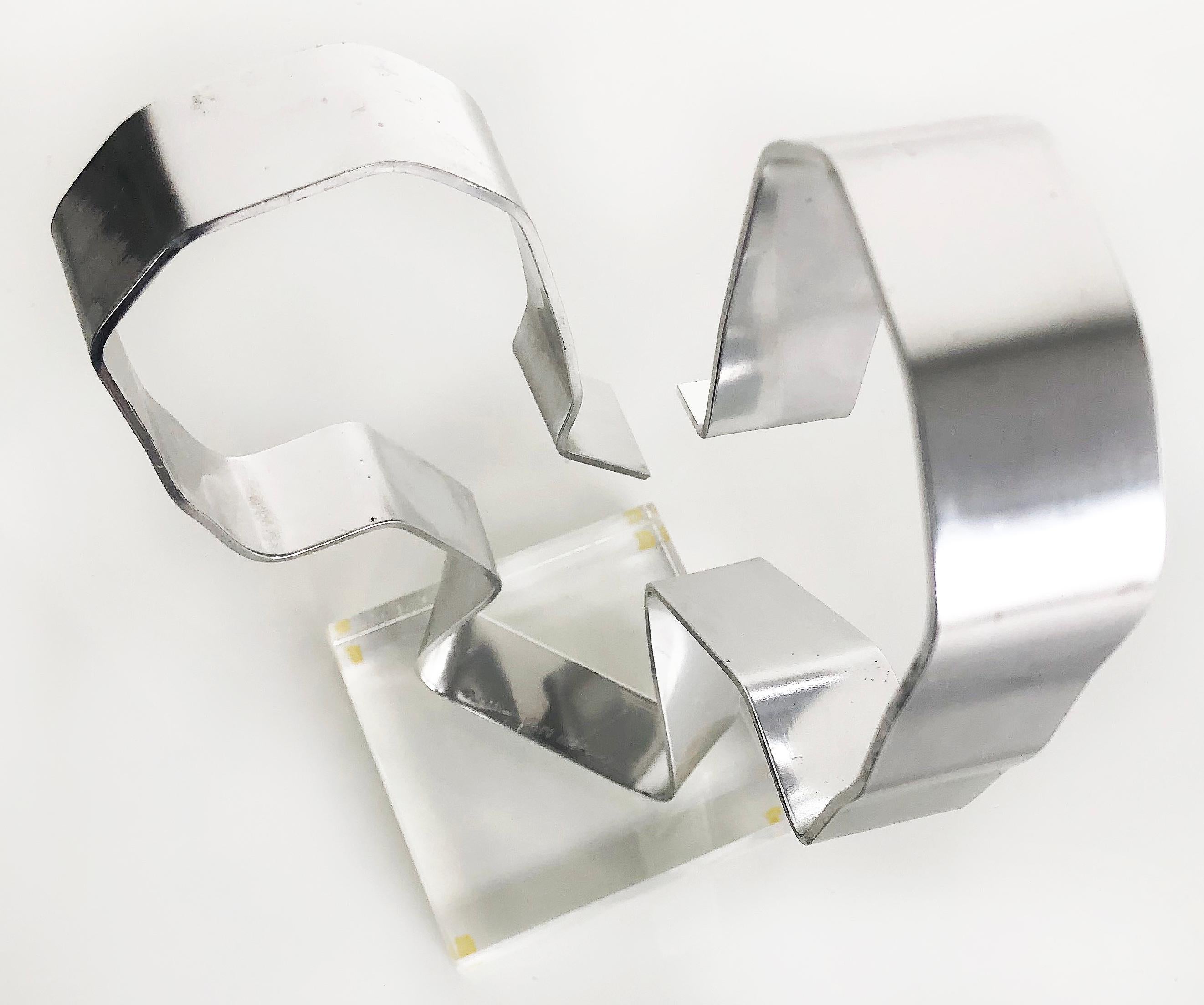 20th Century Dan Murphy Abstract Aluminum Free-form Sculpture on Lucite, Signed & Dated 1977
