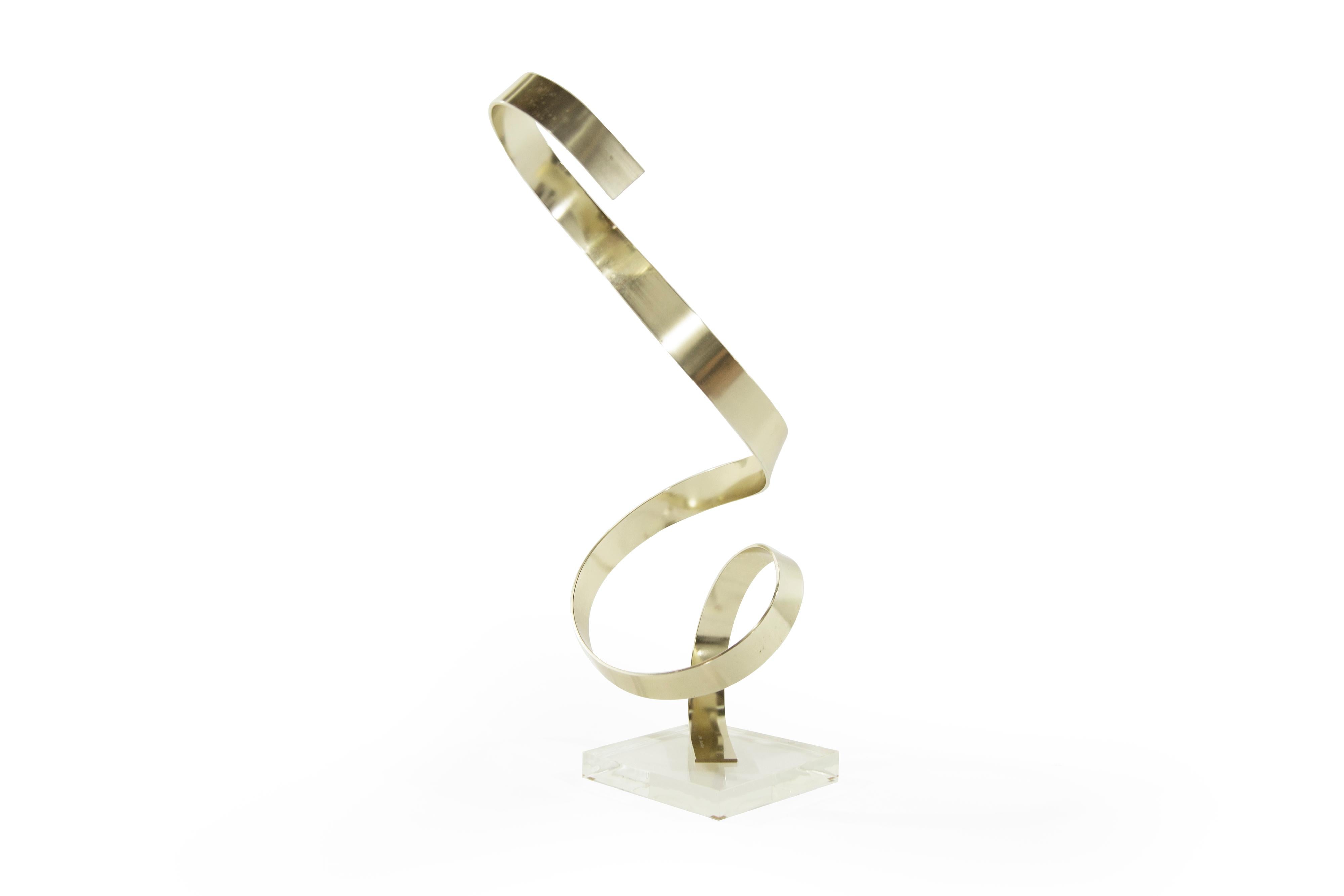 Brass and Lucite sculpture by American artist Dan Murphy, titled 