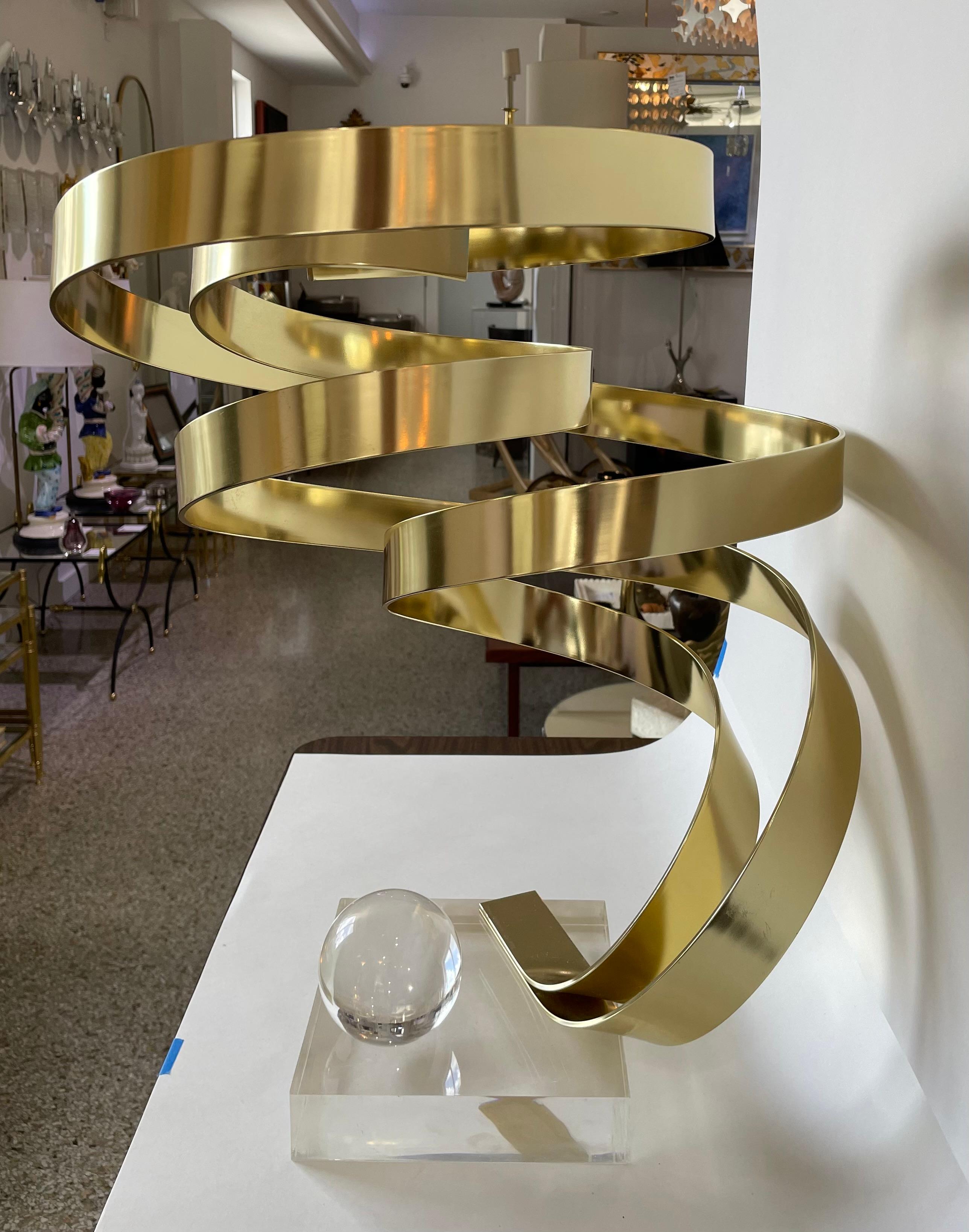 This stylish, chic and cool sculpture by the American artist Dan Murphy will make a subtle statement with its form and use of materials. 

Note: Base dimensions are 6.38