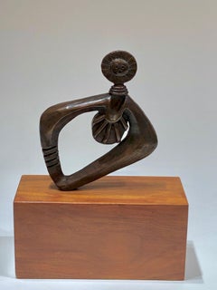 Sun Woman bronze sculpture by Dan Namingha, brown patina, kachina figure