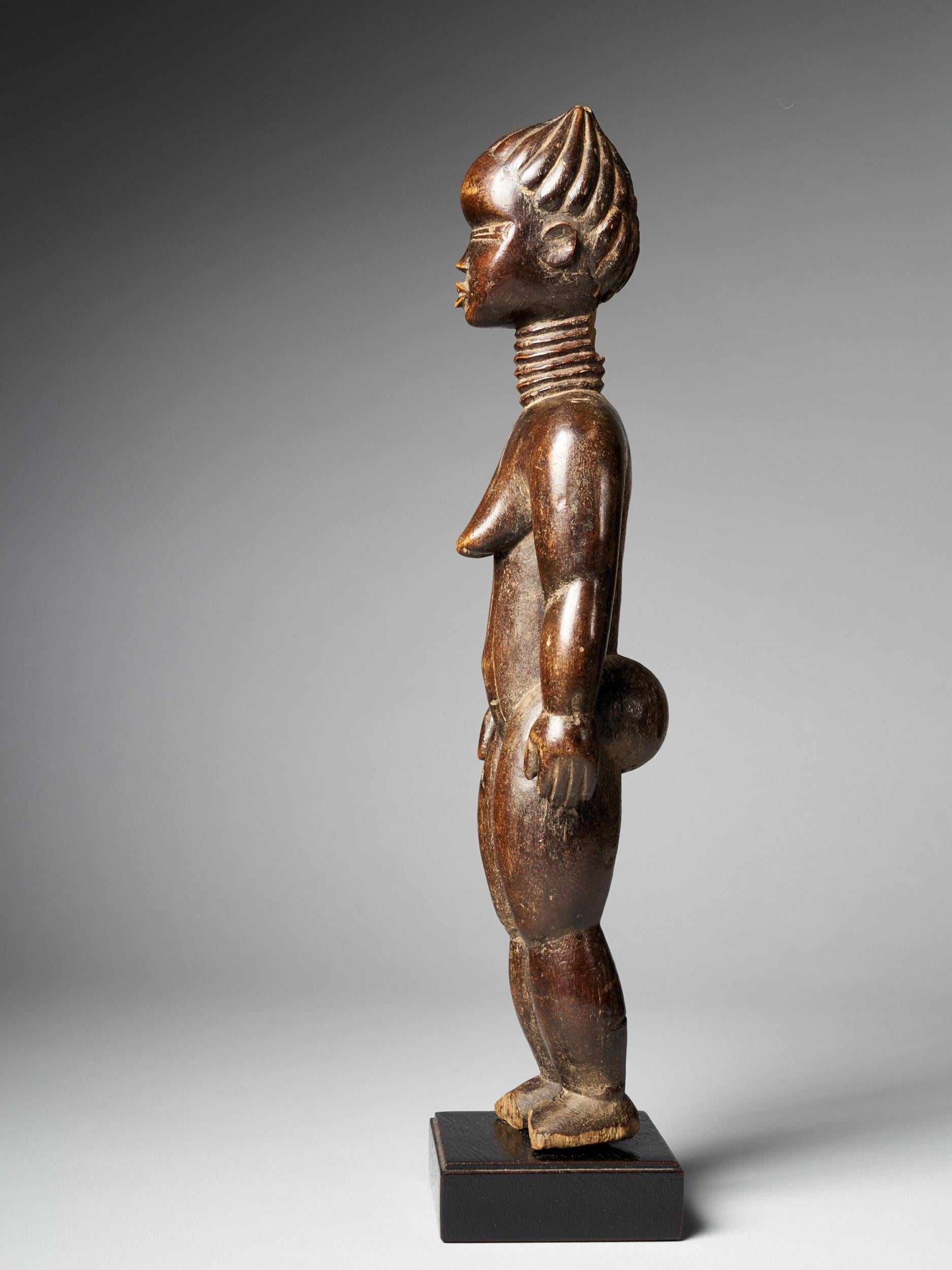 In Dan society, sculptures of women are prestigious objects that reflect positively both on their owners' and their subjects' reputations. Among the most costly of Dan expressive forms, they are commissioned by men to honour an exceptionally