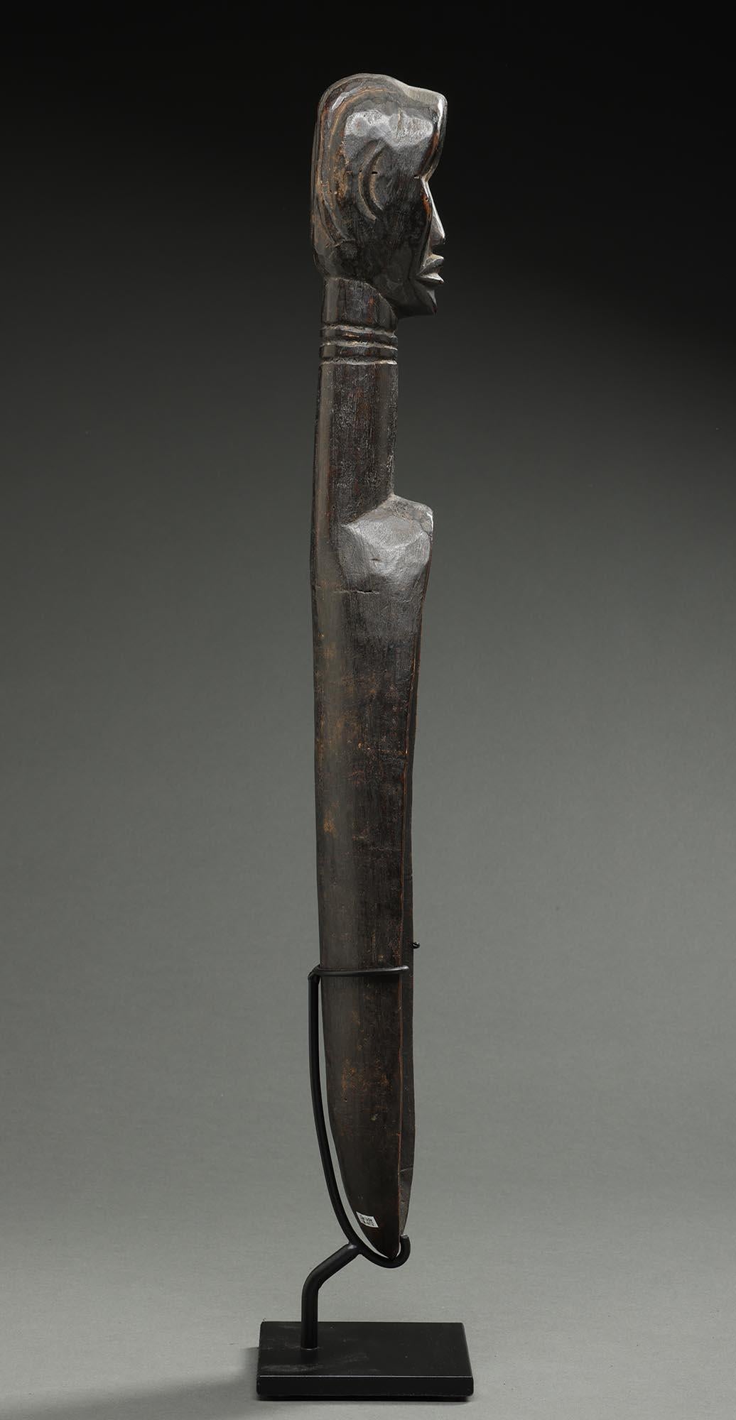 Dan carved wood prestige spoon or ladle, from the Dan people of Ivory Coast, West Africa.  Spoons like this were used by the most prominent woman in the village as a sign of her power and generosity, it was used to distribute food.  Strong carved