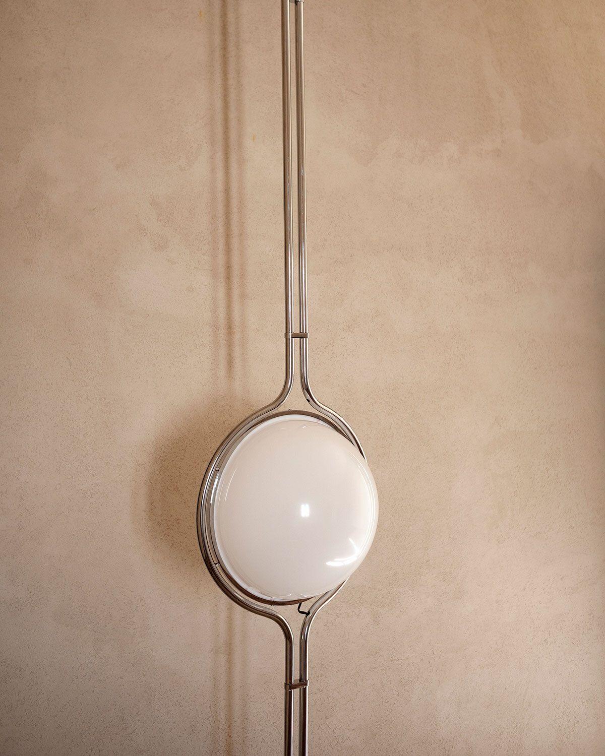 Dana Lamp
Designed by Jean-Pierre Garrault & Henri Delord

Dana is a luminous sphere suspended in time and space, a lamp with an elegant metal structure that captivates the eye with its strong material presence, leaving a striking impression in any