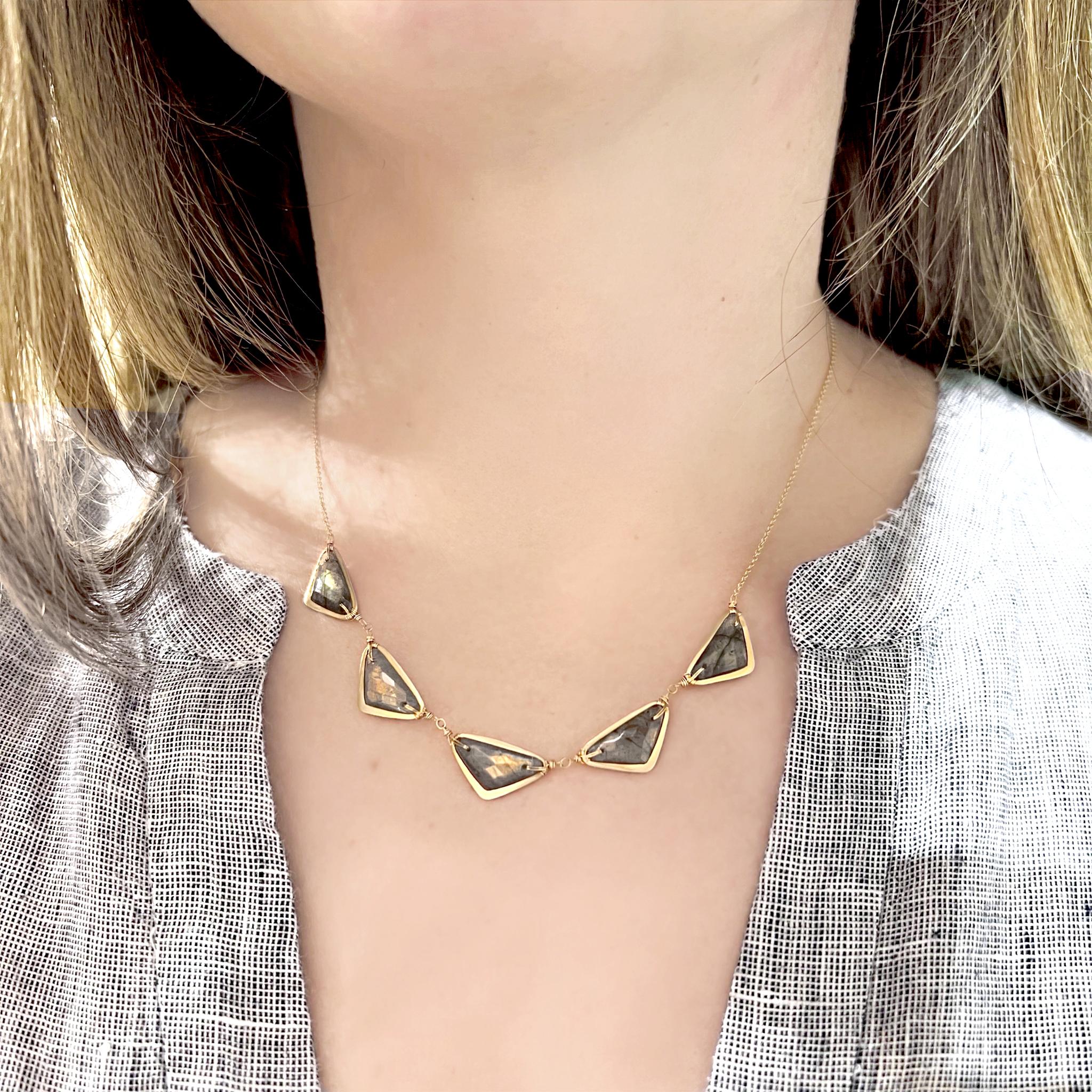 One of a Kind Necklace handmade by acclaimed jewelry designer Dana Kellin featuring five double-sided rose-cut spectrolite (finest labradorite) triangles with spectacular golden flash individually bordered in satin-finished 14k yellow gold and
