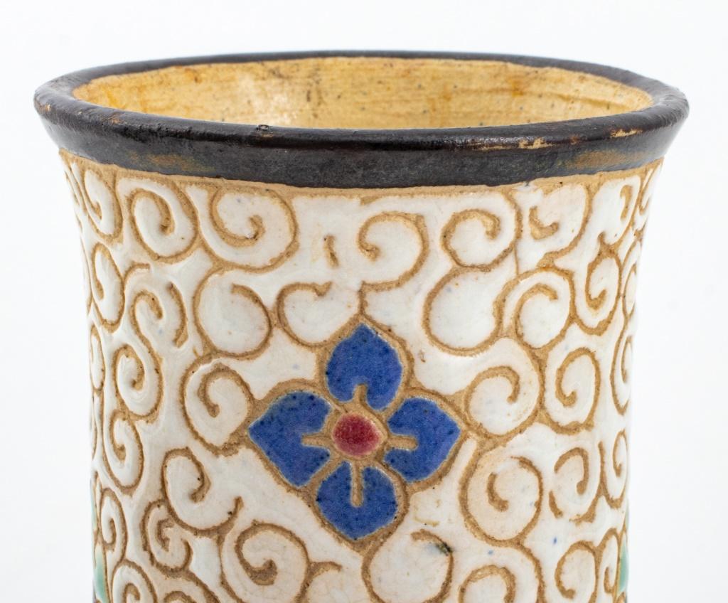 Dana Vietnamese ceramic pottery bottle vase incised with a scrolling design on a white glazed ground with polychrome rosette details, blue underglaze 