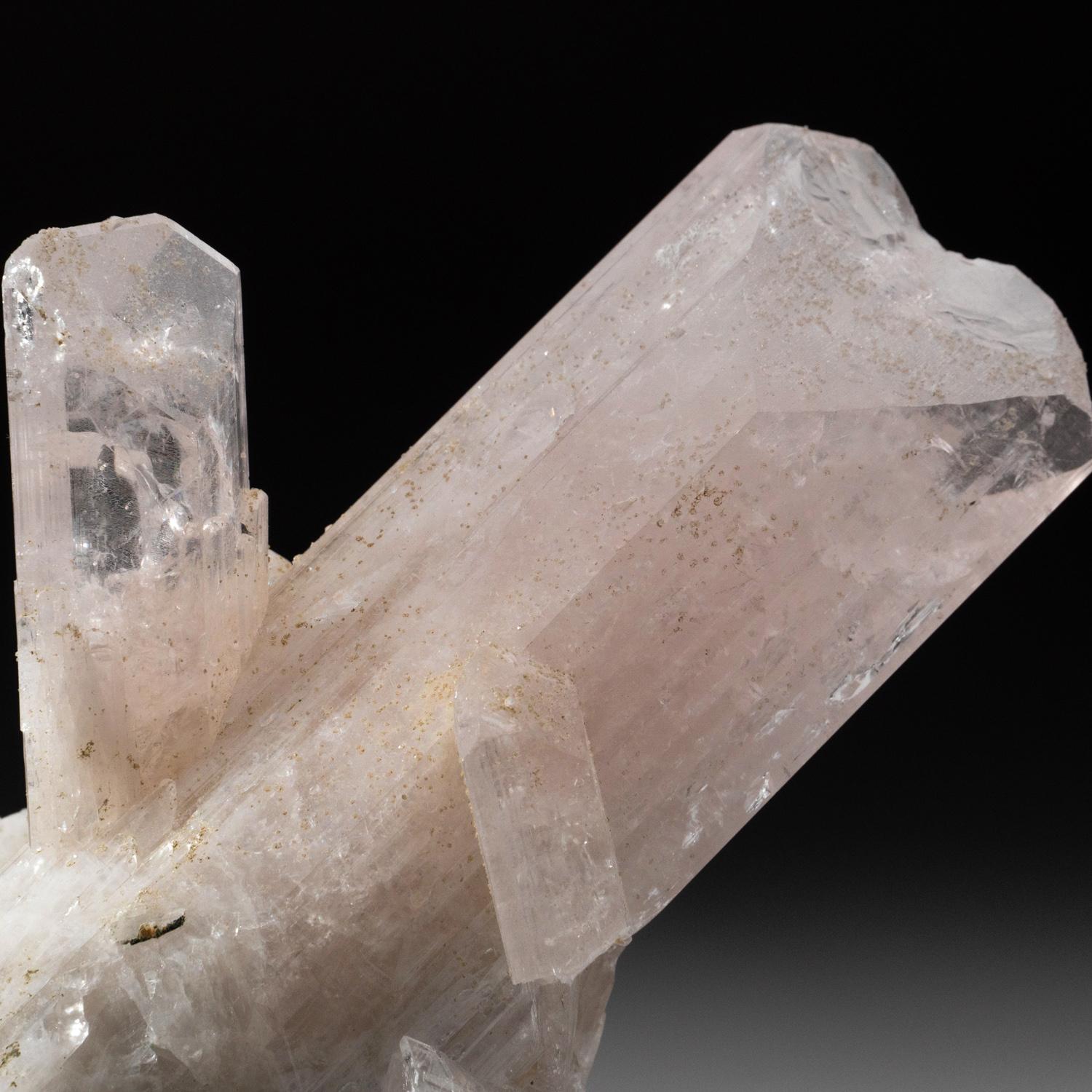 From Mina la Aurora, Charcas District, San Luis Potosi, Mexico. Large transparent to translucent Danburite crystal with secondary growth on matrix. The danburite has lustrous striated crystal faces. This specimen is highly sought after for its