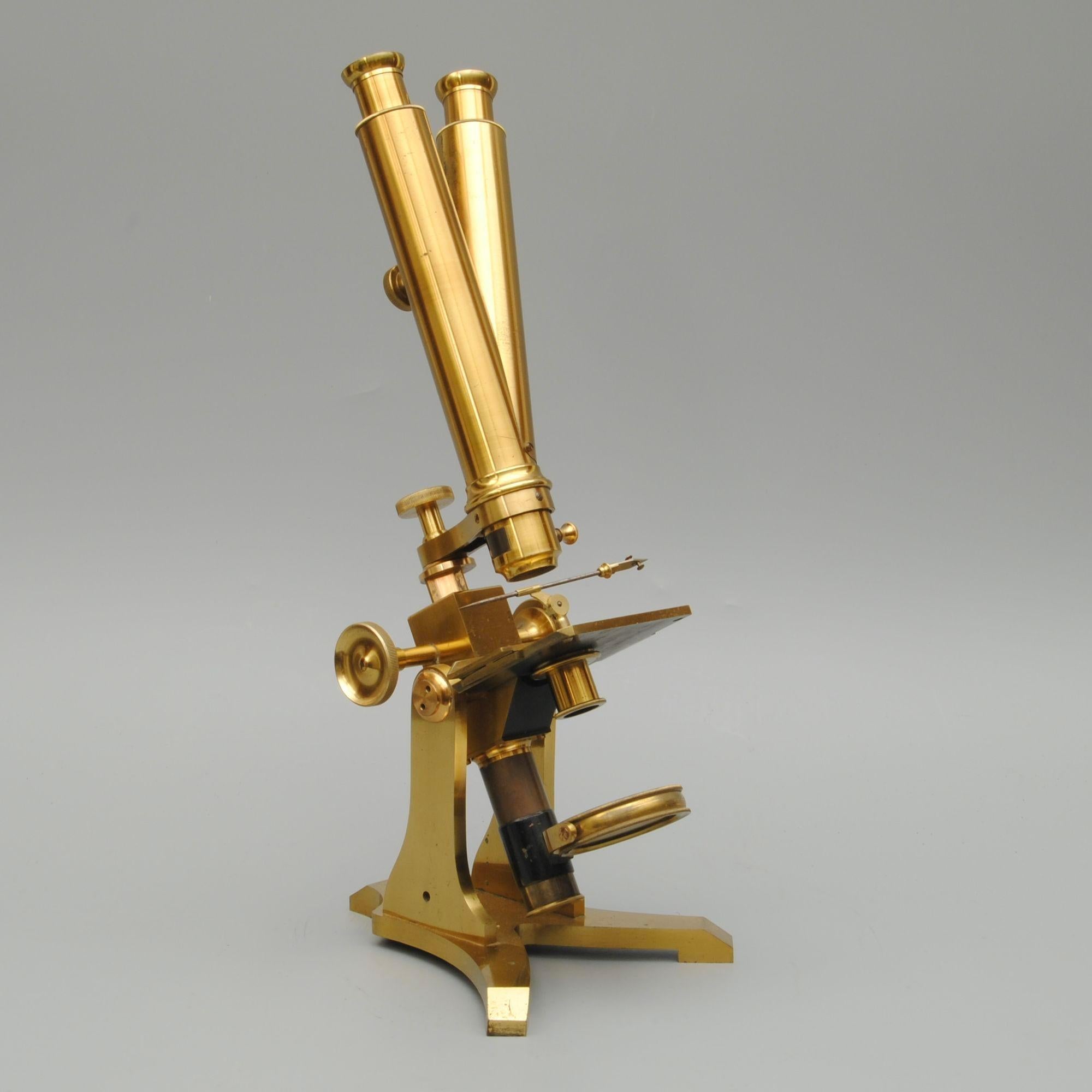 A very clean and complete Dancer field microscope designed to fit into a small case for use in the field. 
This example is numbered 38 and has a Wenham prism that neatly slides into place. Good lacquer throughout and accessories complete including