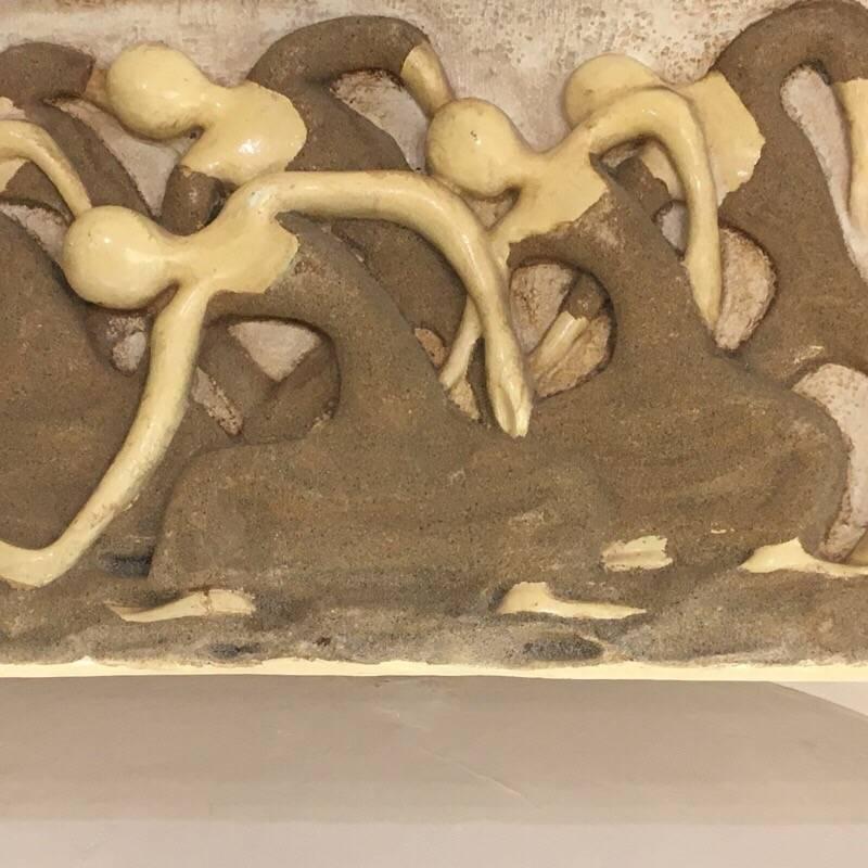 Finesse originals wall sculpture made of fiberglass and resin representing sand dancers.

 