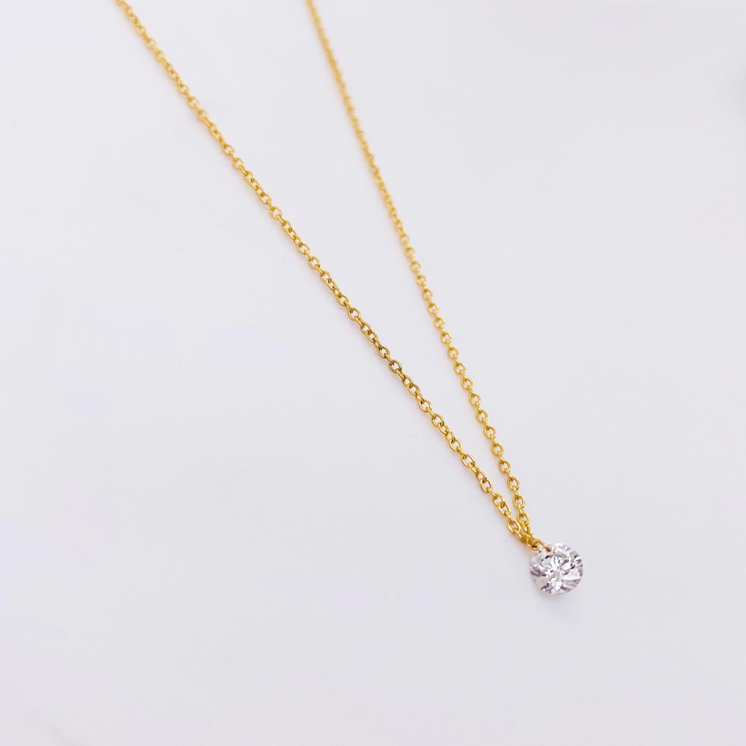 dancing diamond necklace yellow gold
