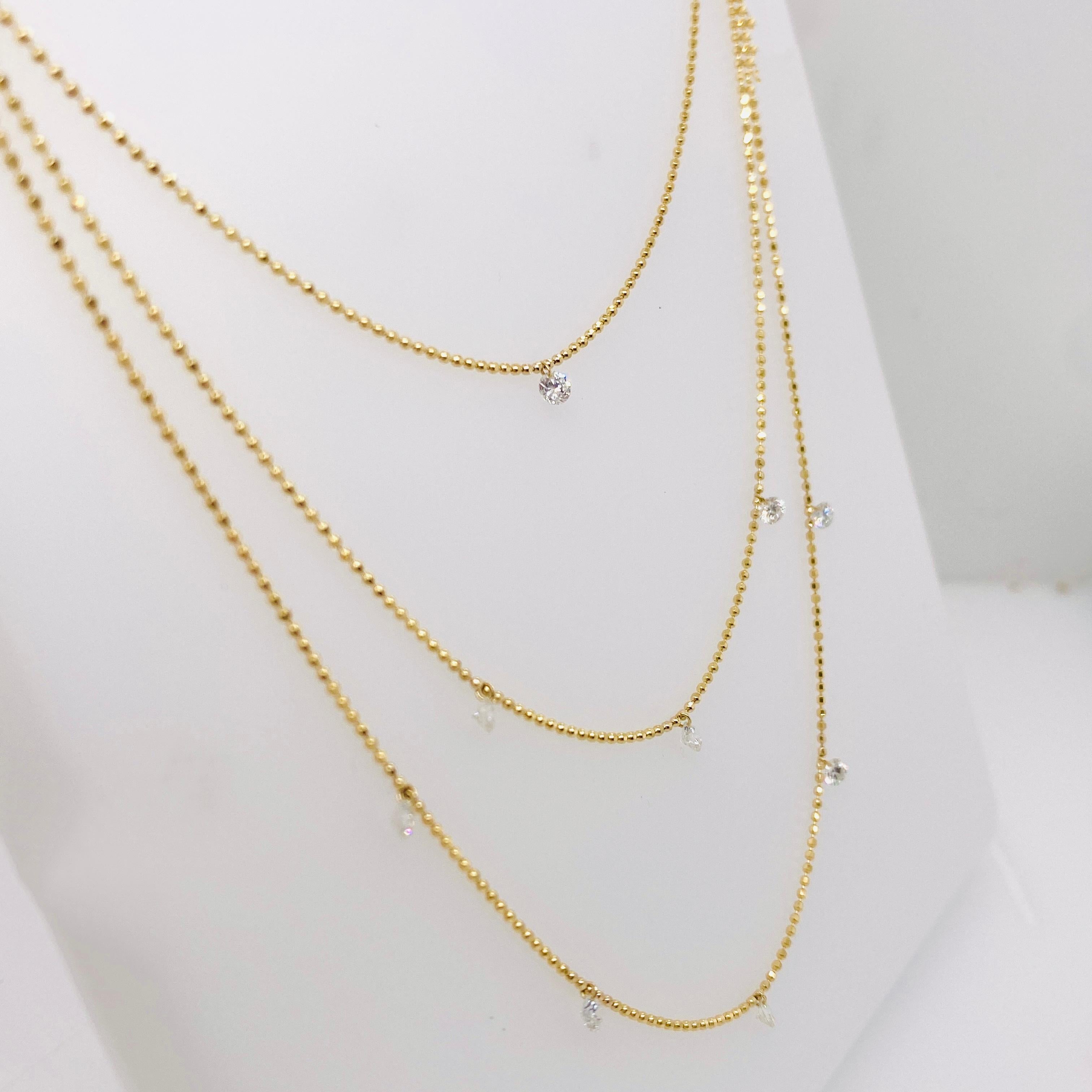 Contemporary Dashing Diamond Three Layer Necklace .72 Carats in 14K Yellow Gold Beaded Chain For Sale