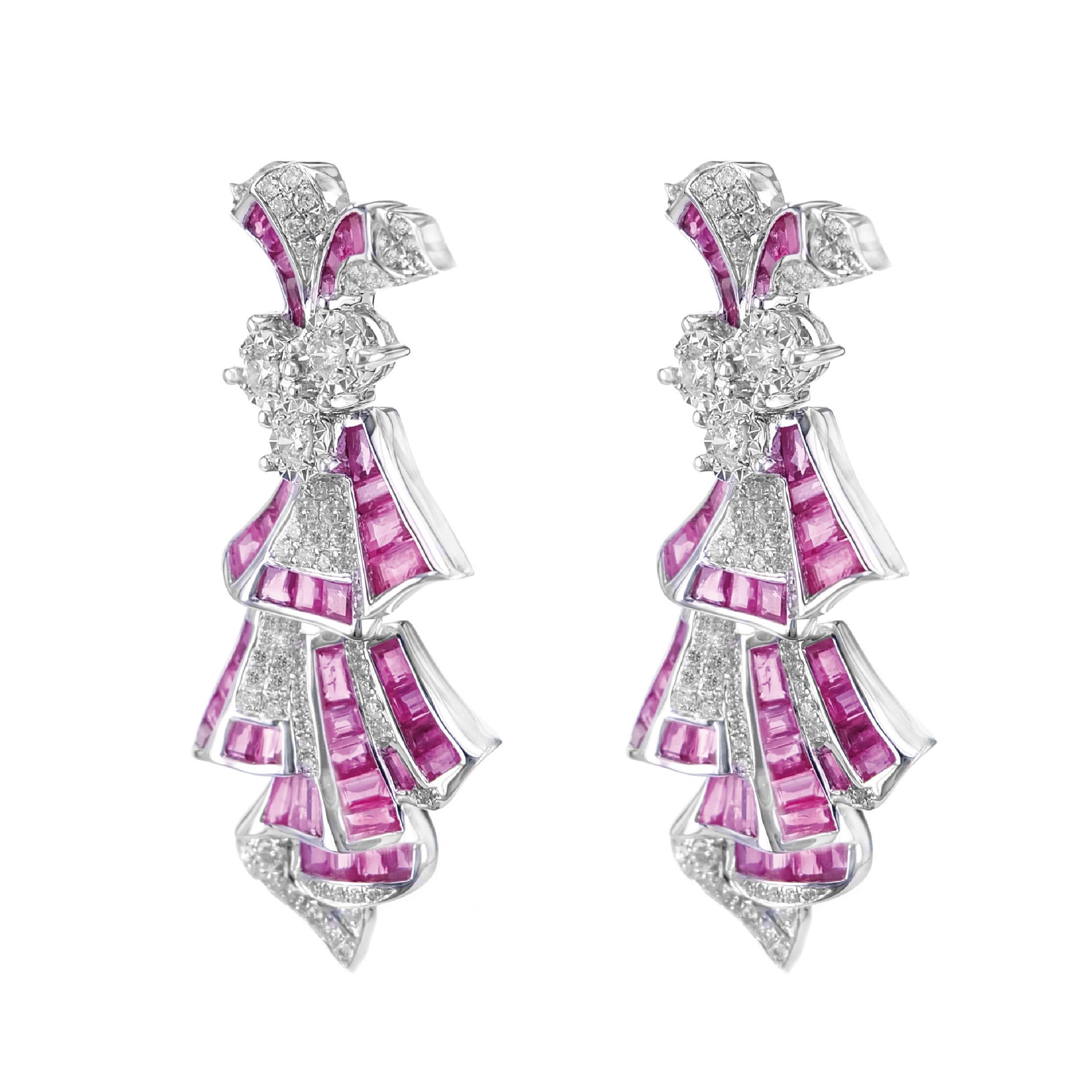 Inspired by a dancing doll, the movements of the earring resemble the poetic motion of a dancing doll. 6.73 carats of vivid red ruby and 1.14 carat of white round brilliant diamond are set in this dangle earring.
The details of the diamond are