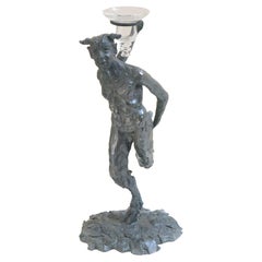 Porte-bougies faune dansant en bronze de Patrick Laroche