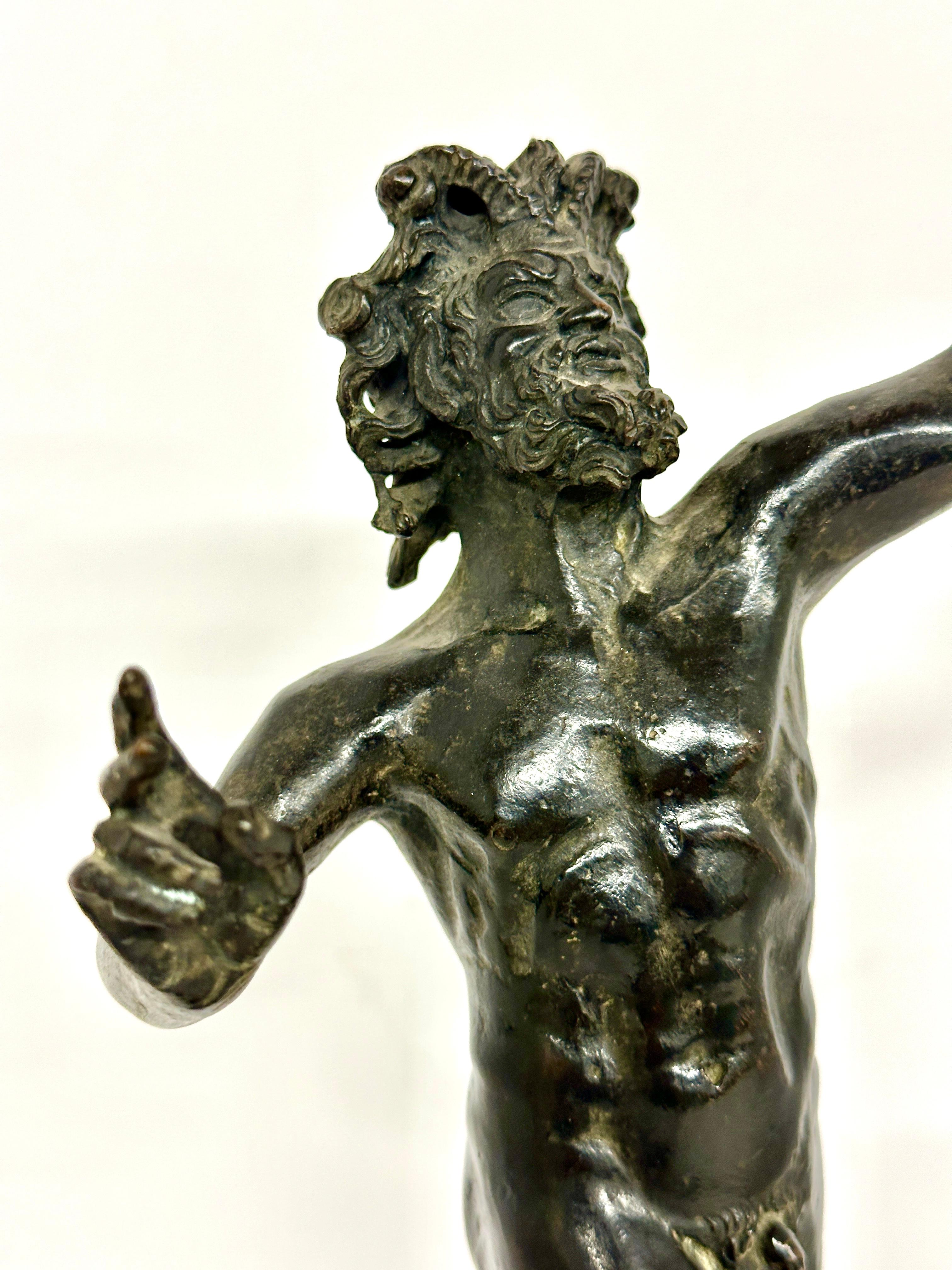 A lovely  and well cast example of the Pompeian Dancing Faun. This grand tour bronze stands approx 11.75 inches tall about half size of the original unearthed in Pompeii. Beautiful patina.
In good condition.
