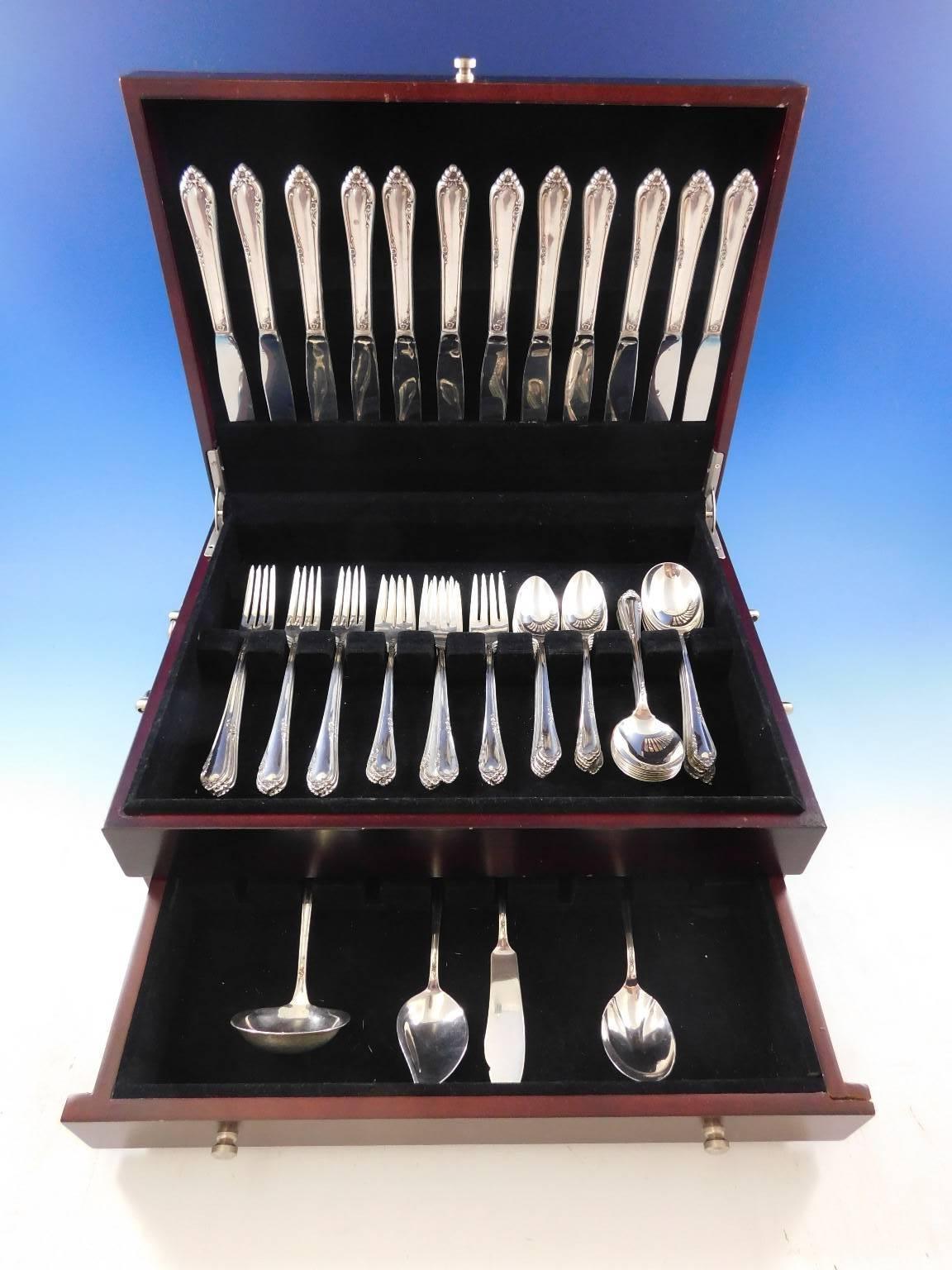 Dancing Flowers by Reed & Barton sterling silver Flatware set, 64 pieces. This set includes:

    12 Knives, 8 7/8