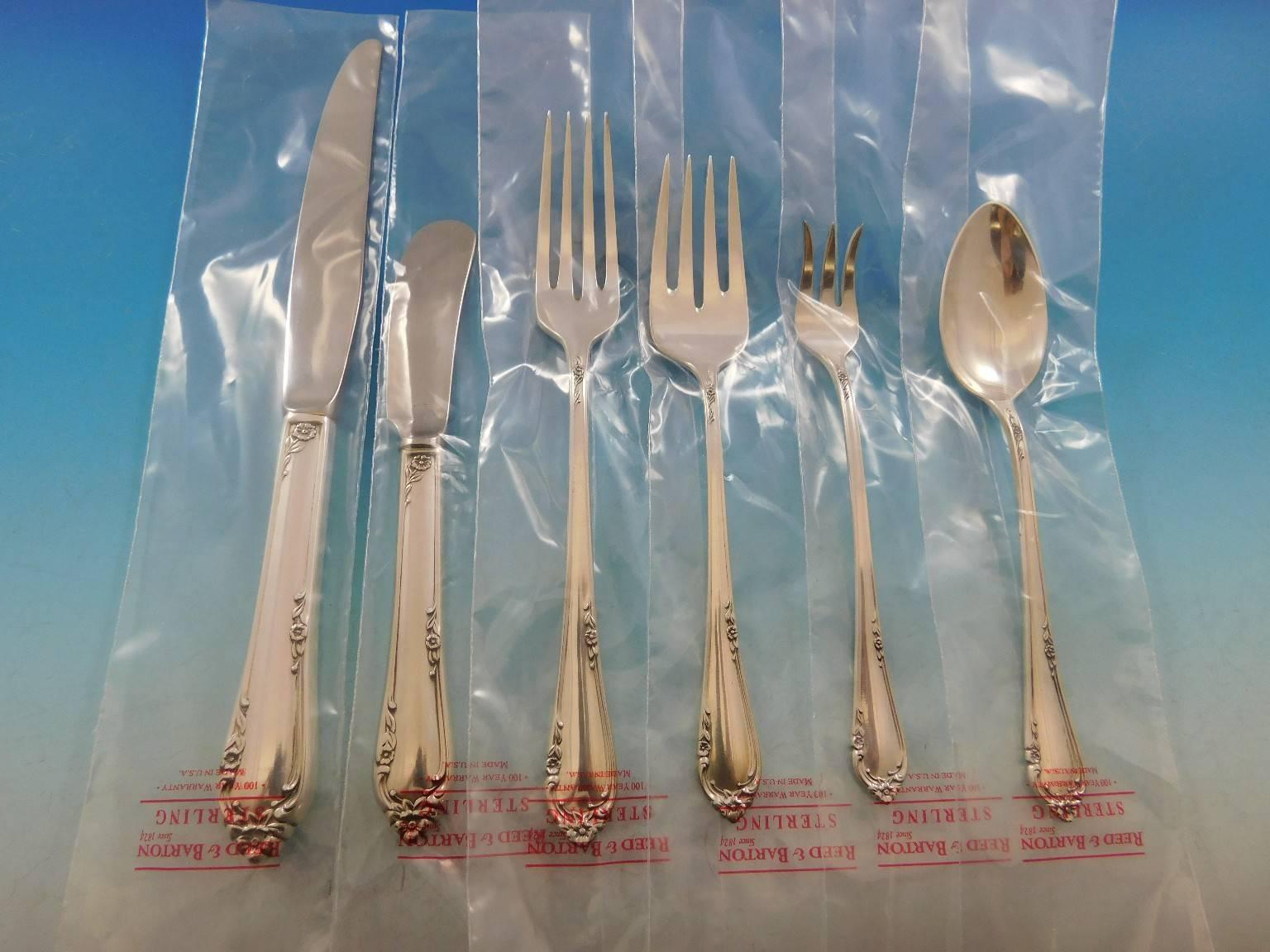 Unused Dancing Flowers by Reed & Barton sterling silver Flatware set - 83 pieces. This set includes:

    12 Knives, 8 7/8