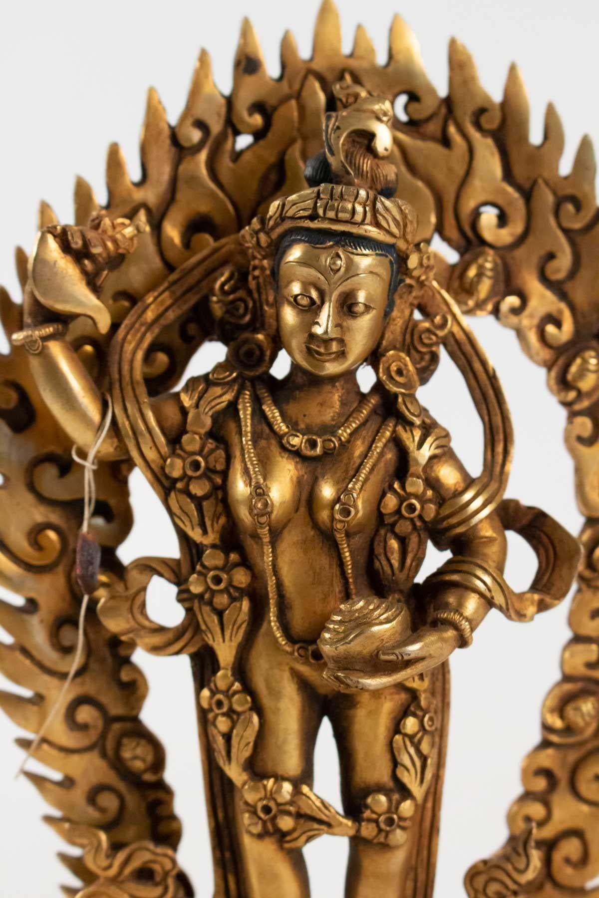 Dancing Goddess hitting the floor to awaken the good geniuses, antiquities, tibet, gilt bronze, very finely chiseled.
Measures: H 20cm, W 13cm, W 6cm.