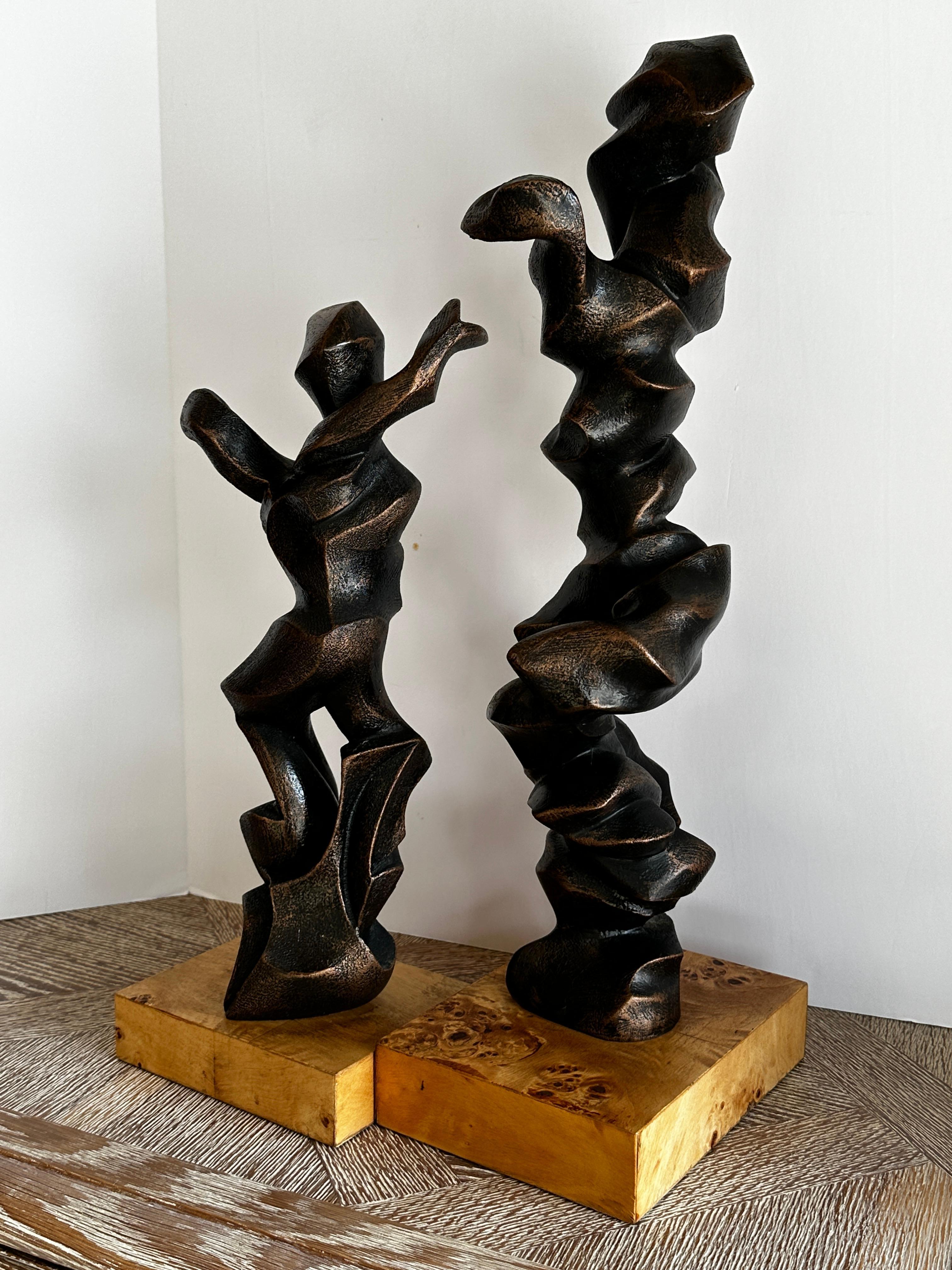 Sculpture is at its most essential, a physical, tactile medium, and need to be touched to be experienced. Handmade resin sculpture is an intricate process that entails the mastery of various skills and techniques. 

This pair of dancers, in gun
