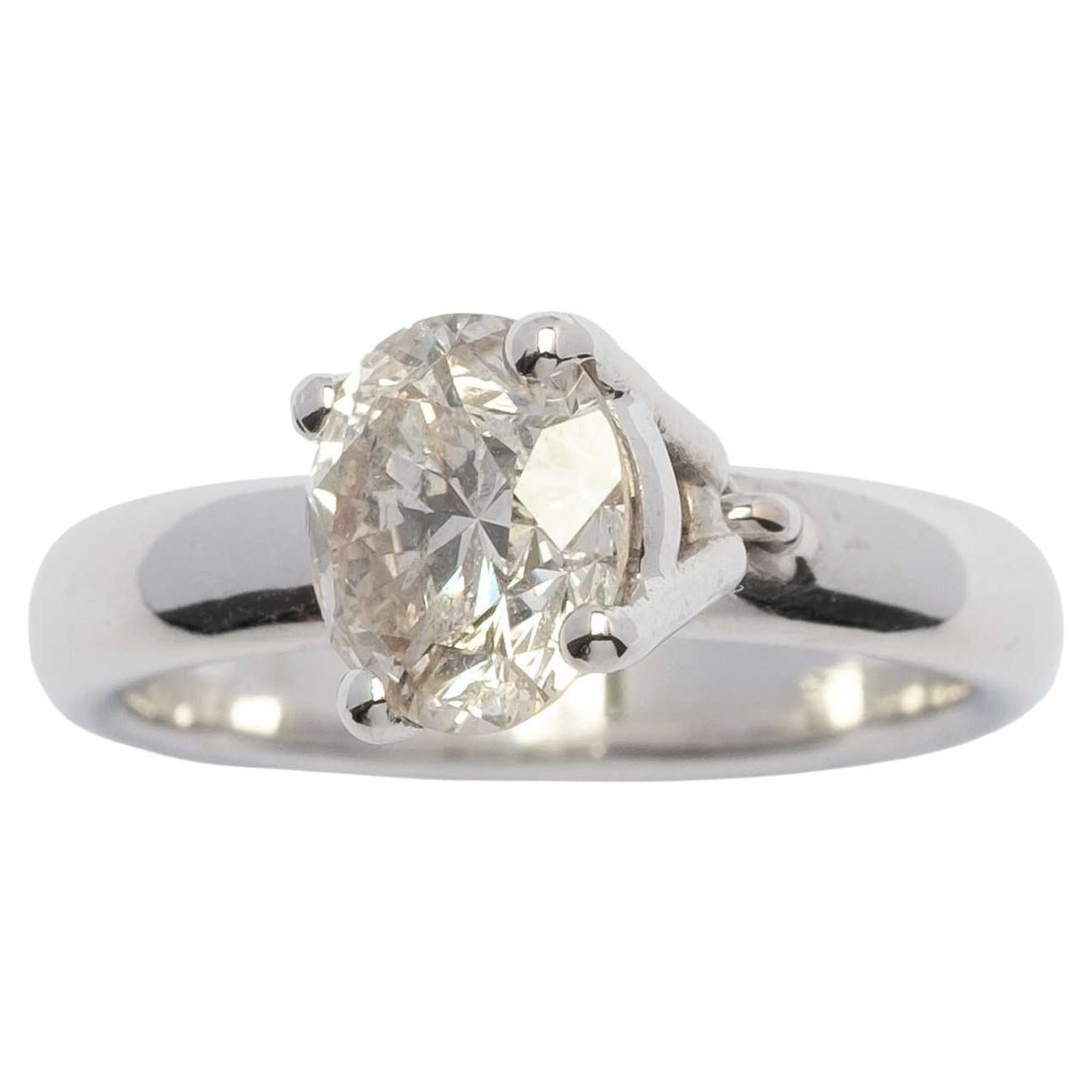 Dancing solitaire diamond ring