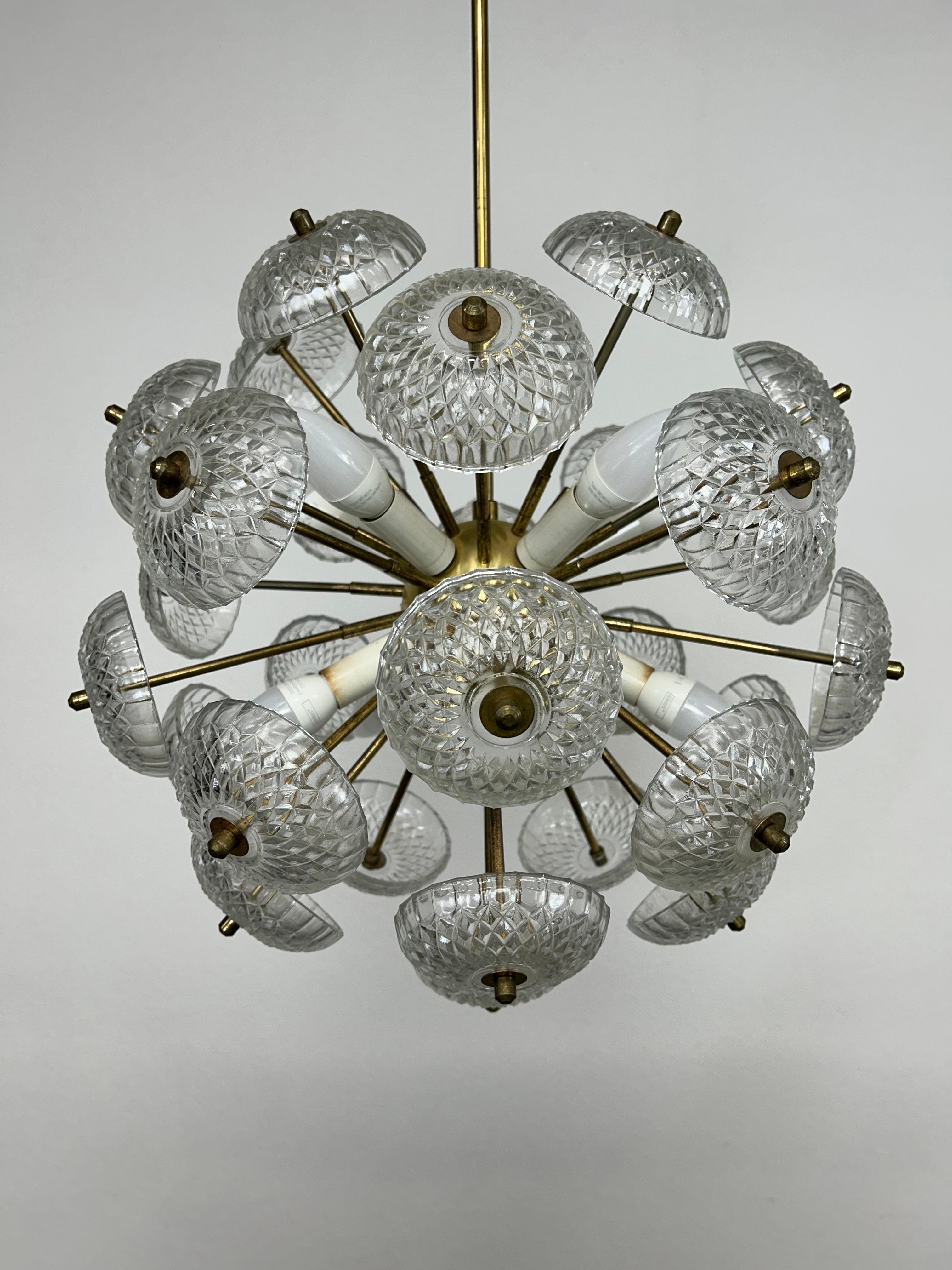 Space age Dandelion chandelier by Kamenický Šenov in very nice original condition. One arm with glass is missing from the top , not visible in plain view.