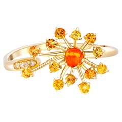 Bague fleur de dandelion avec saphirs et diamants 