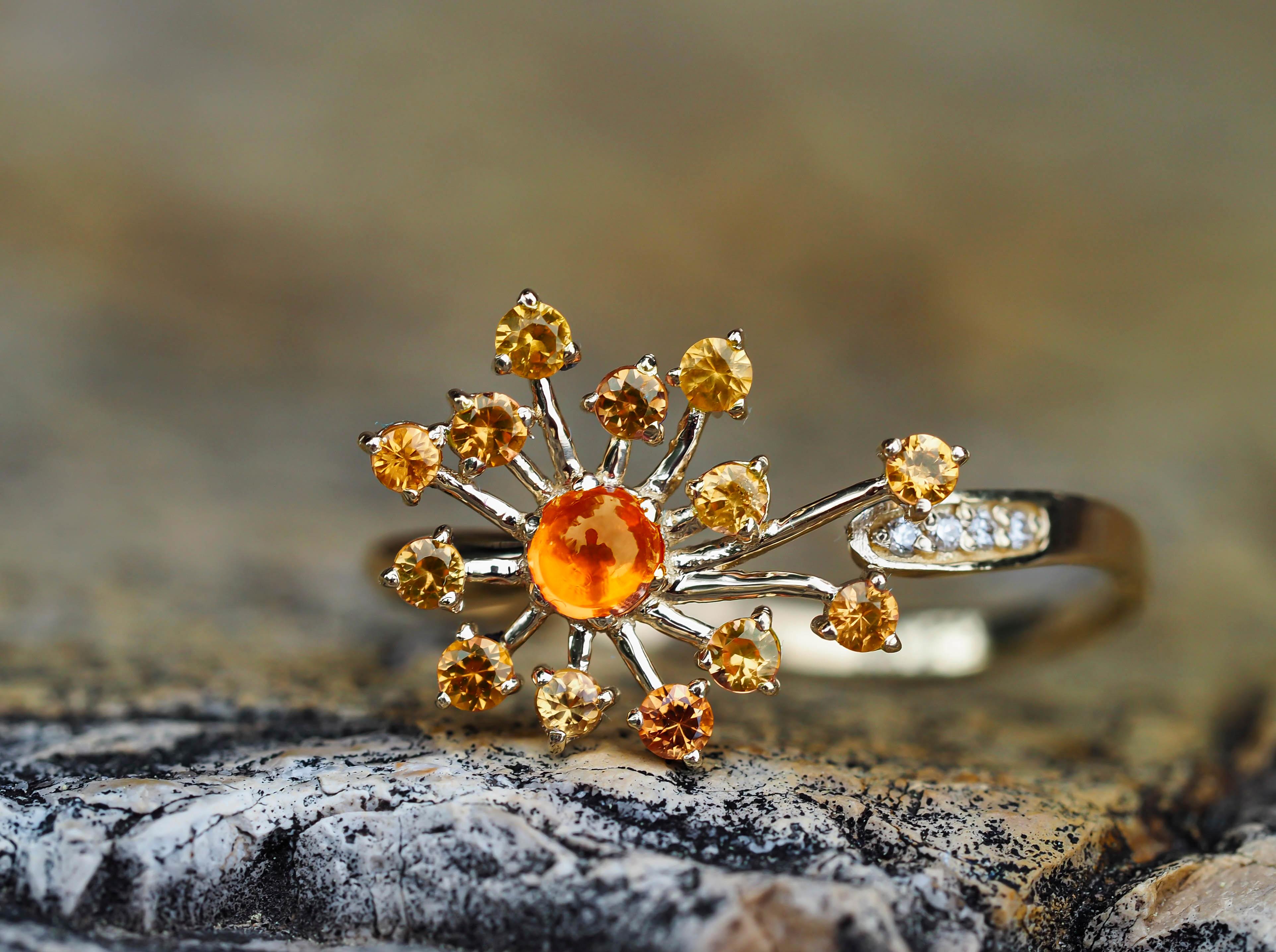 Dandelion Flower set: ring and earrings with yellow sapphires and diamonds

Earrings:
Metal: 14 karat gold
Weight: 1.45 g.
Size: 15 x 12.4 mm.
Central stones: Genuine sapphires
Cut: Round cabochon
Weight: approx 0.60 ct.
Color: Yellow
Clarity: