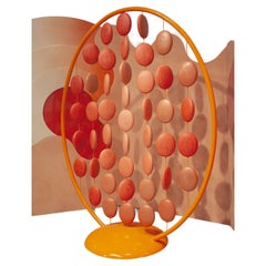 "Dandelion" screen, powder coated metal and orange cold metallization pellets