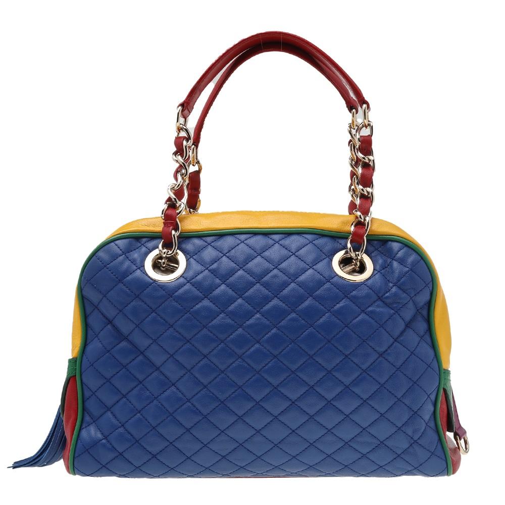 This Lily Glam Bowler bag from D&G is gorgeous in design and highly functional. Crafted from leather, the bag features multiple colors, quilting, two handles, gold-tone hardware, and fabric compartments for your necessities. The bag will be a luxe