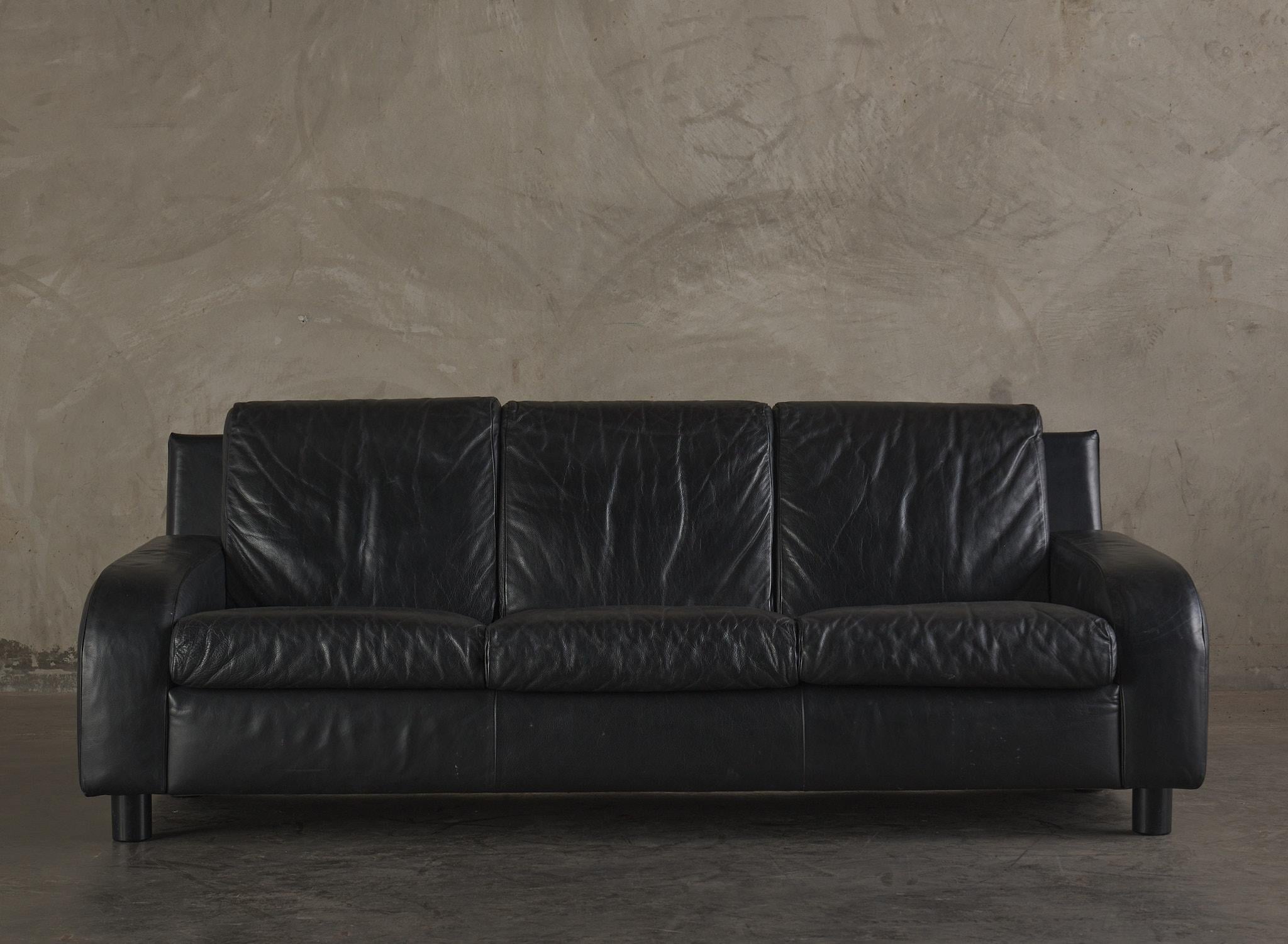 This warm and cozy three seated modern sofa is a diverse choice for many decorative concepts and ideas. Slouchy cushions and comfortable for stretching out your legs or watching television.