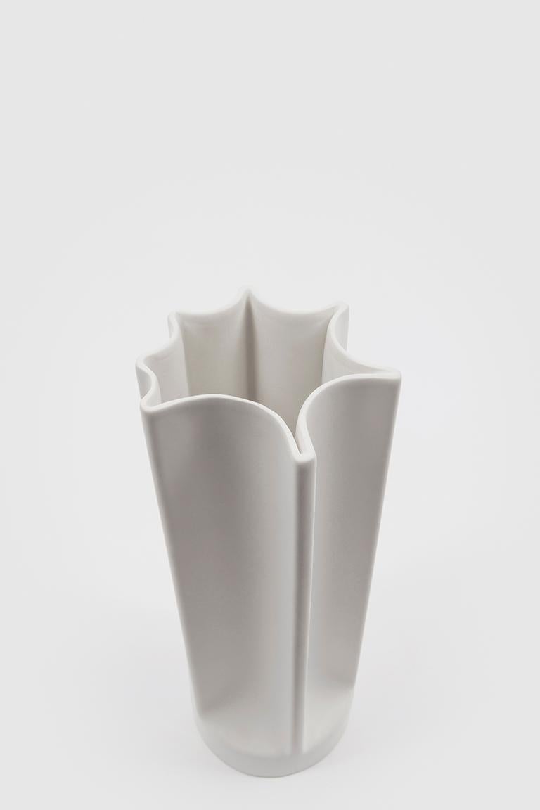 Bambu is the outcome of extensive research into industrial production processes and their implications for the work done by human hands with more traditional techniques. The re-edition of this collection of vases is ceramic with an opaque white