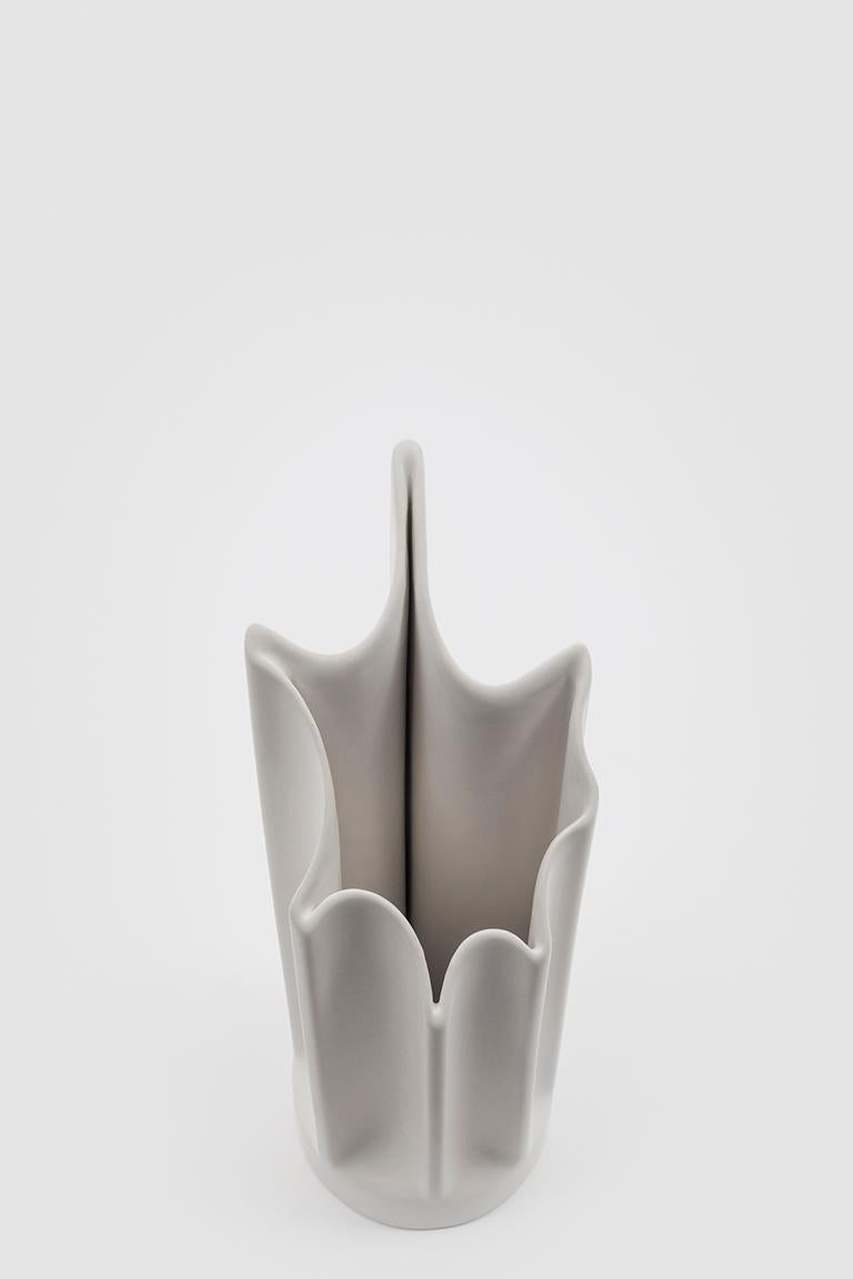 Bambu is the outcome of extensive research into industrial production processes and their implications for the work done by human hands with more traditional techniques. The re-edition of this collection of vases is ceramic with an opaque white