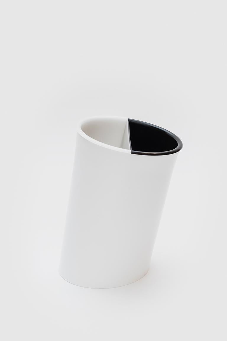 Danese Milano Compartment for In Attesa/Koro waste paper basket in black by Enzo Mari

Enzo Mari is one of the masters of Italian Design. He was born in Novara in 1932 and now lives in Milan where he first moved to train as an artist. His work