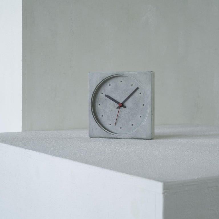 Danese Milano Kuno prey concrete clock. Italy, 1986.    This is a very rare post-modern concrete clock designed by Kuno Prey for the Milanese company Danese. A very distinct and modern design which is remarkably timeless. It was designed in 1986 and