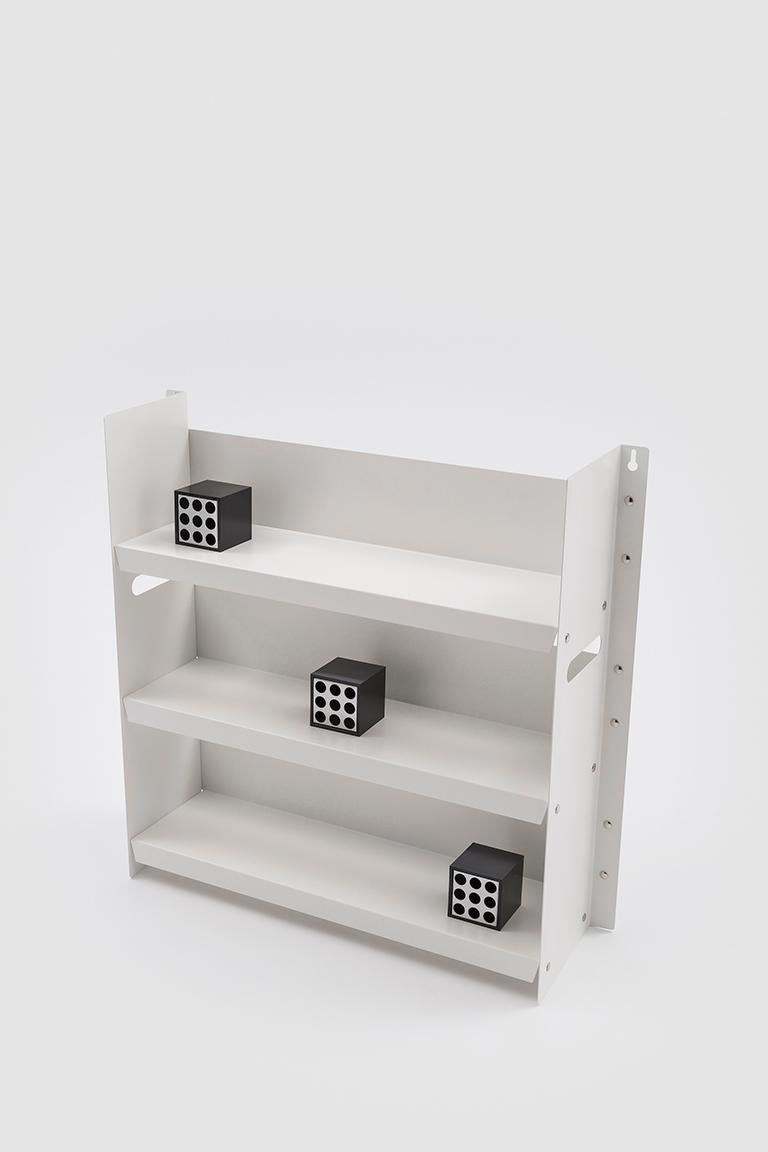White Livorno 60 is a small bookcase with three shelves made in powder-coated metal. The design of the piece is minimal and is characterized by the simplicity of the form and materials used.

Marco Ferreri is an architect who is capable of