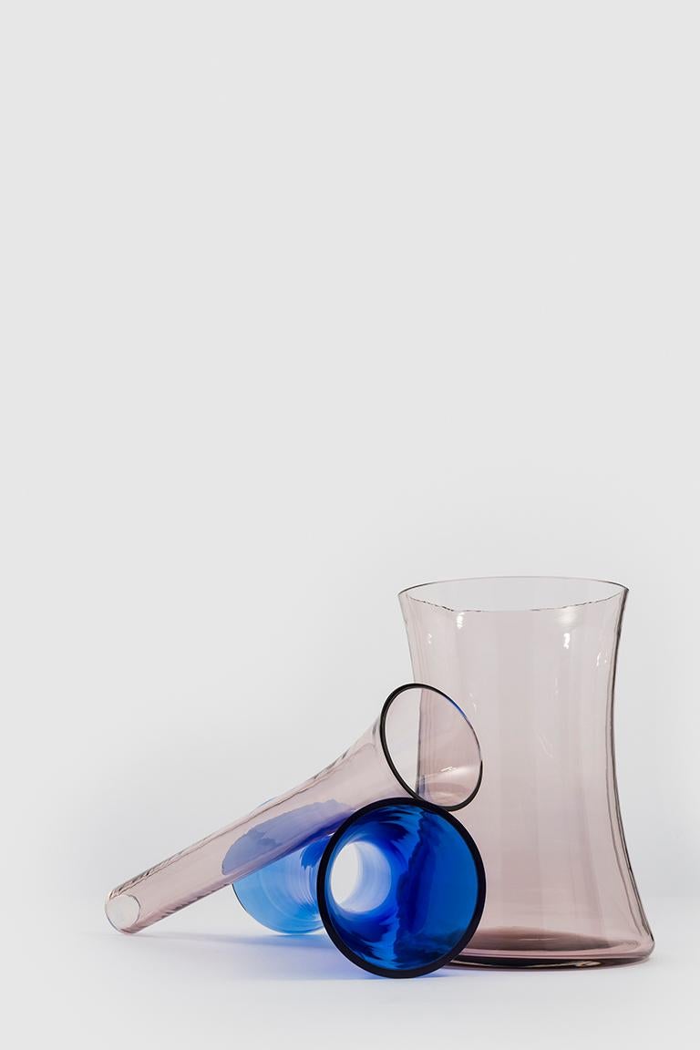 Murano D is a re-edition of the classic vase made using the traditional craft of glass blowing, but with an astute optimization of the production process. This piece combines subtle lines and colours to create a range of different vases designed to
