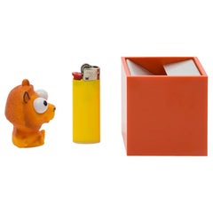 Petit cendrier Cubo Danese Milano en aluminium orange de Bruno Munari